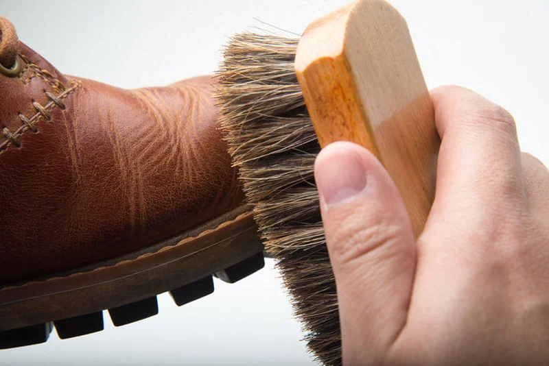 using-horse-hair-brush-on-boots-daily-boot-maintenance.jpg