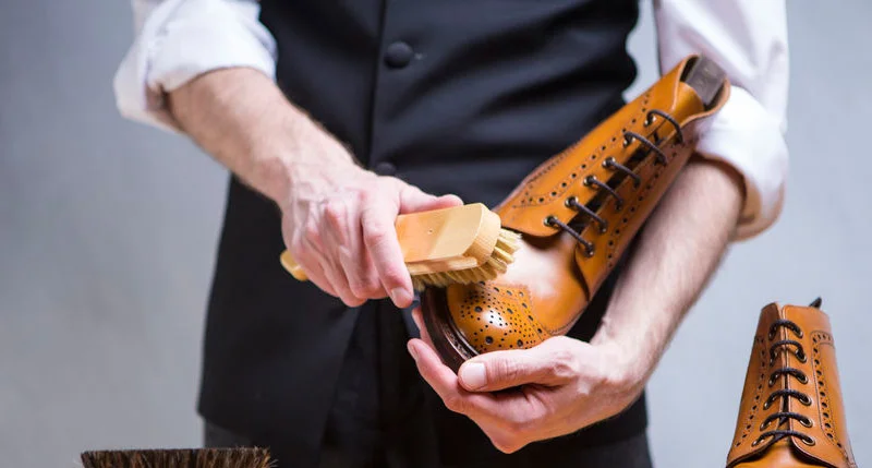 how-to-clean-leather-boots-cleaning-boot-with-brush.jpg