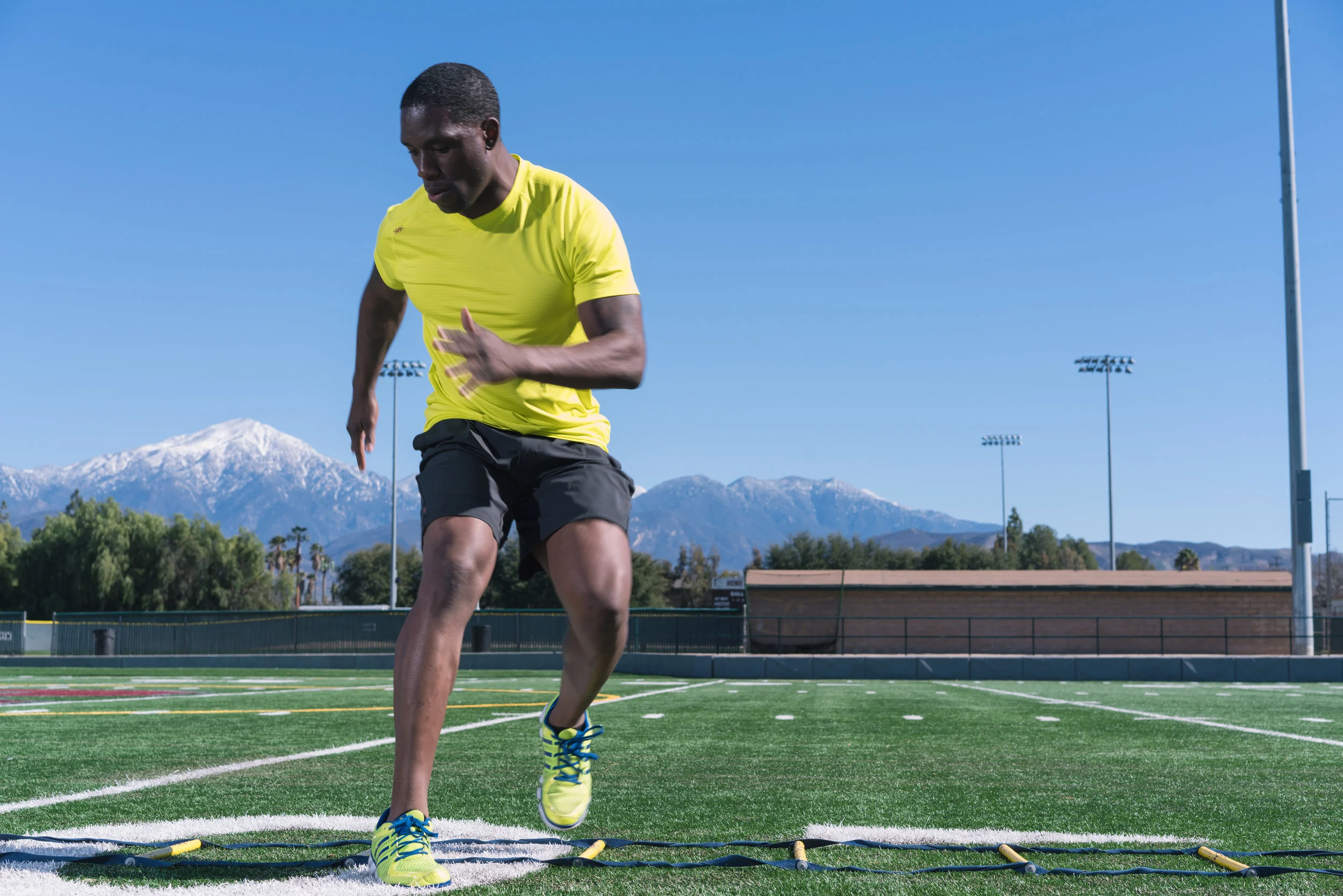 Rhone_Spring2016_Track&Field_YellowShirt_06.jpg