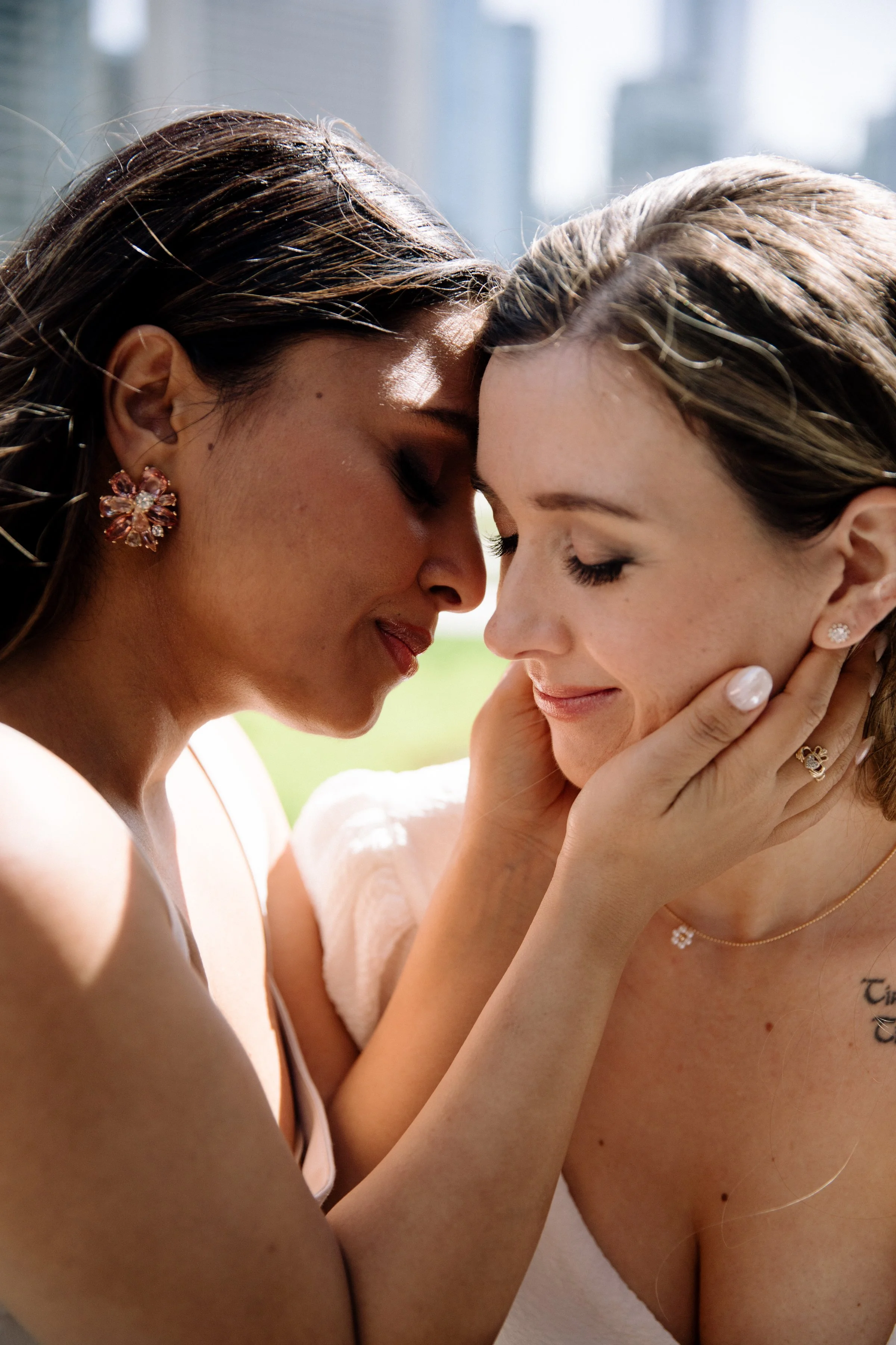 Editorial inspired portrait of two brides on their LGBTQ+ elopement day in downtown Toronto