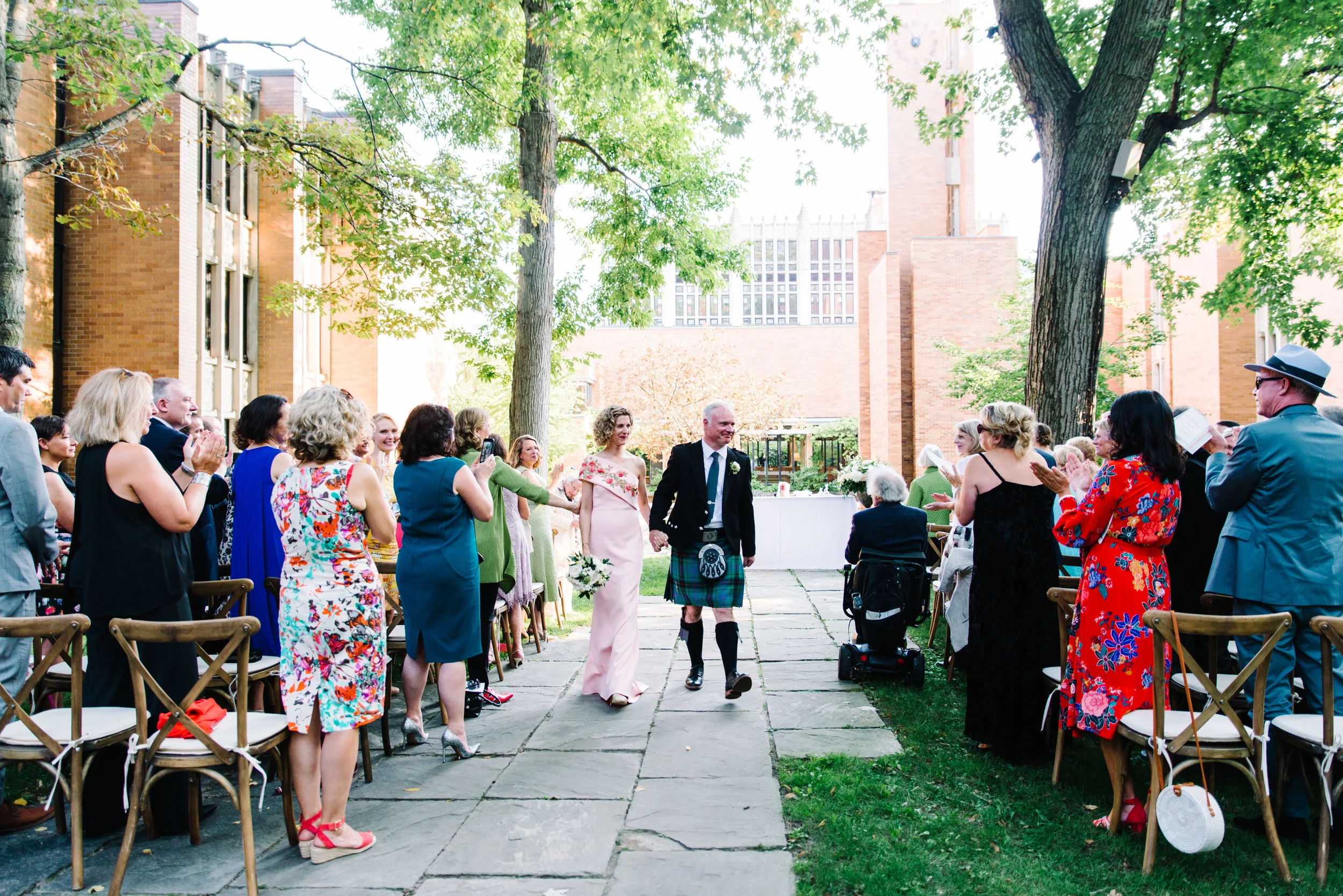 Outdoor wedding ceremony at Massey College, on campus at the University of Toronto