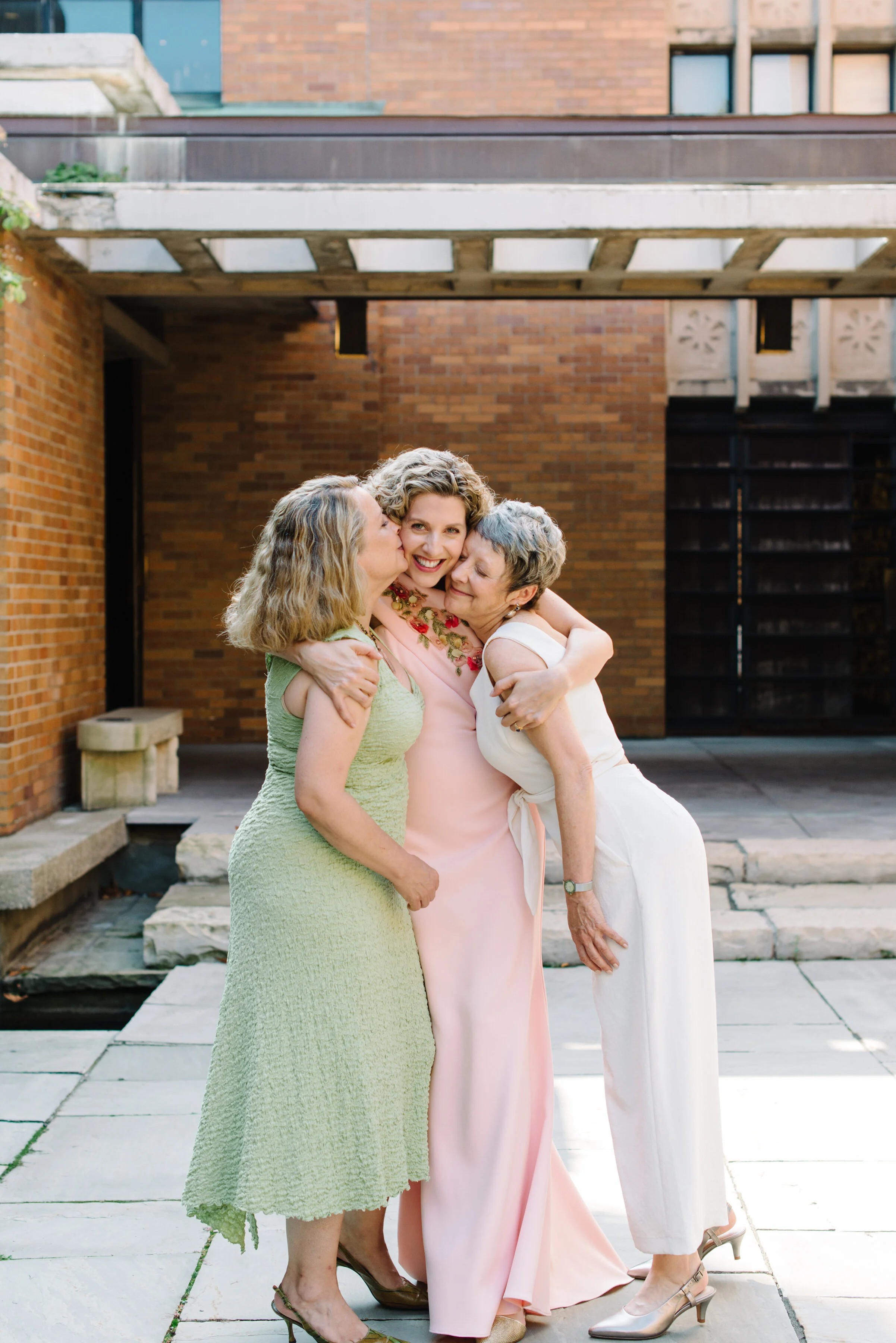 Candid group photo at intimate Toronto wedding Massey College