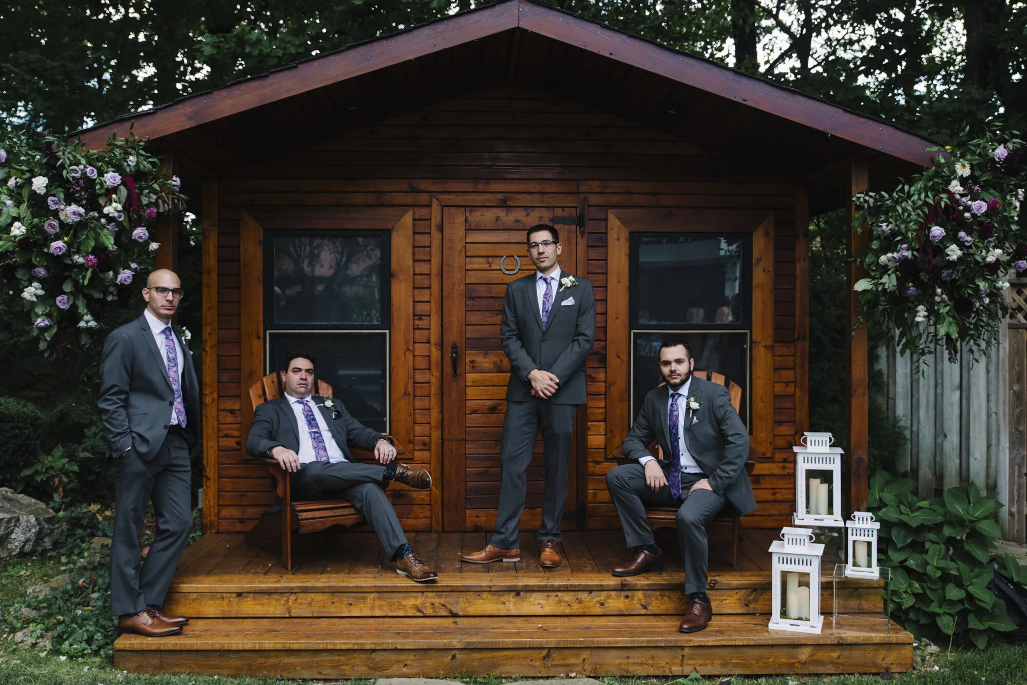 Editorial inspired portrait of a groom and his groomsmen at an intimate backyard elopement in Mississauga
