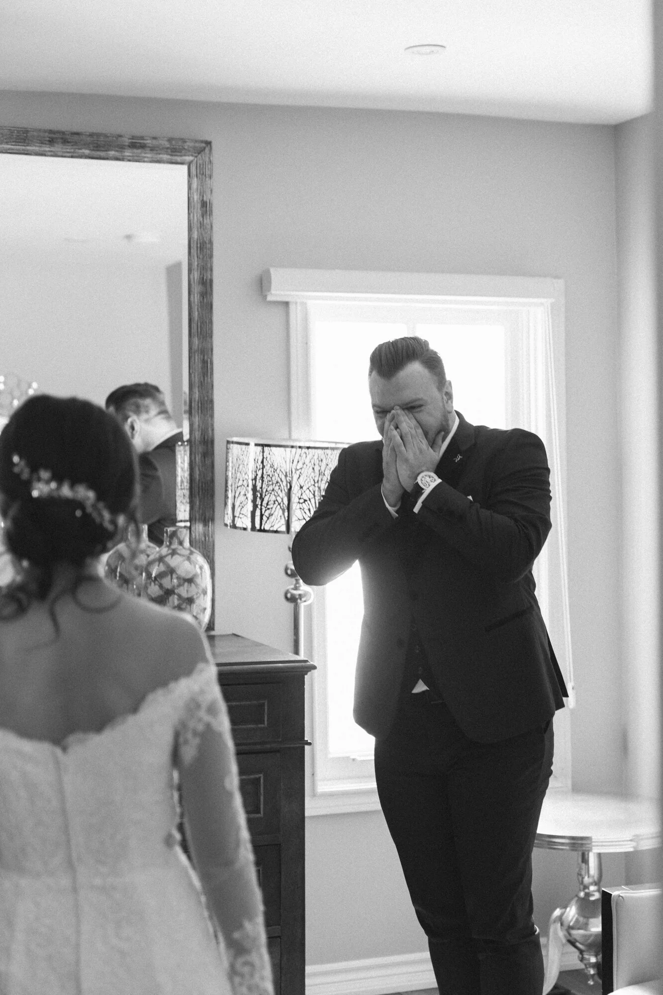 Authentic and emotional black and white wedding photography of couple at their first look at the Doctor's House in Kleinburg
