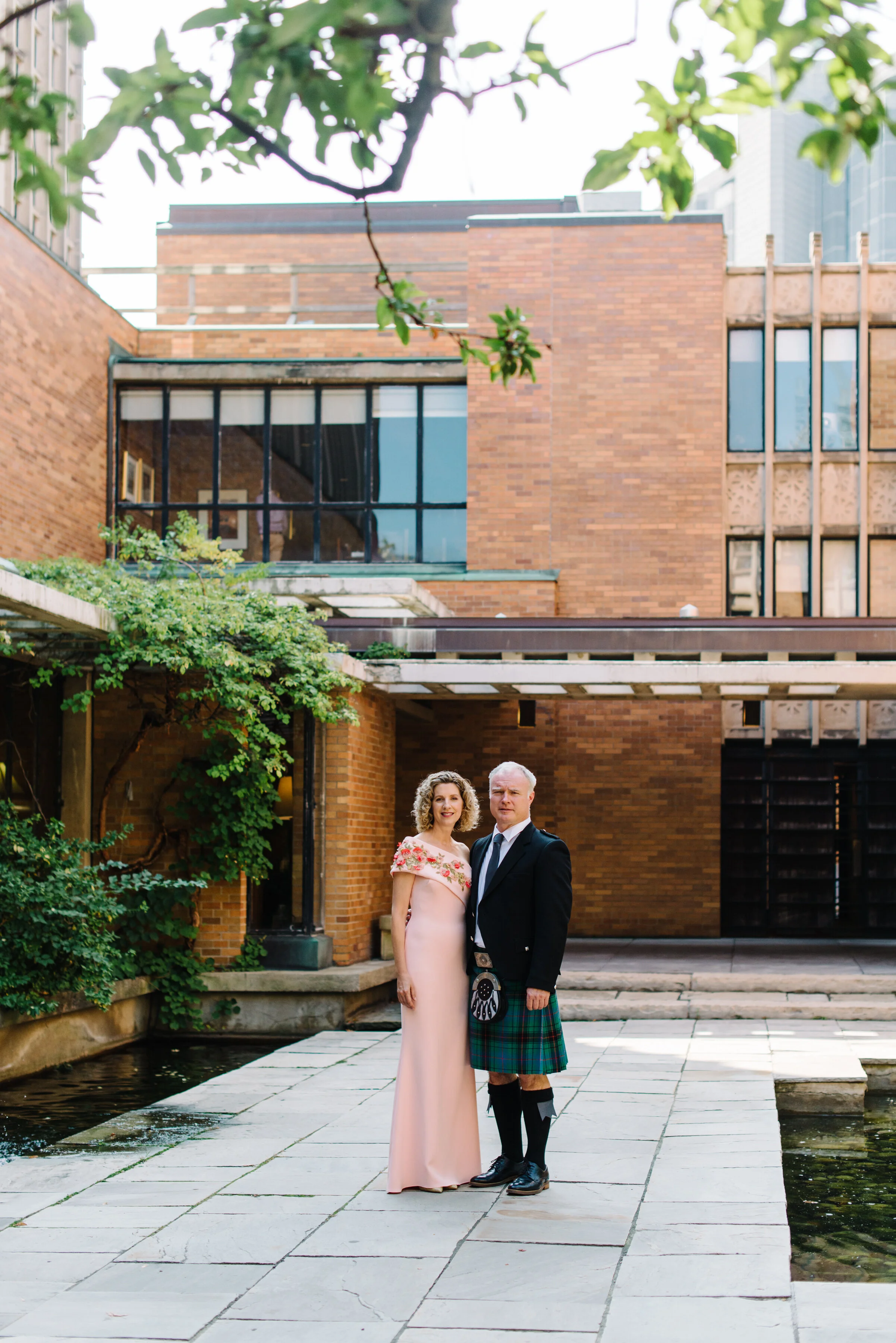 Couple portrait in Massey College courtyard Toronto wedding