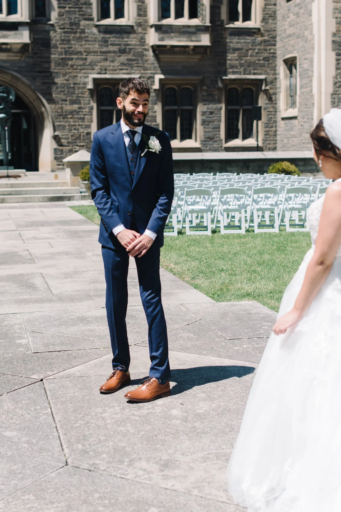 A heartfelt first look between a bride and groom at Hart House during a Toronto wedding