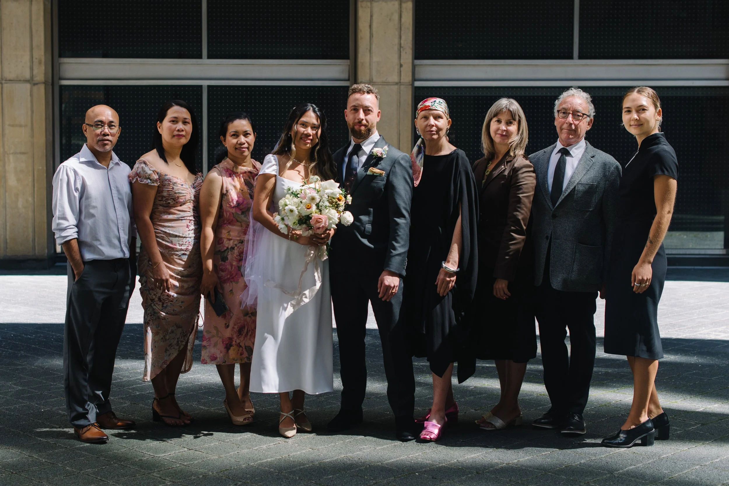 Editorial inspired formal family portrait on the terrace at Toronto City Hall following an intimate elopement