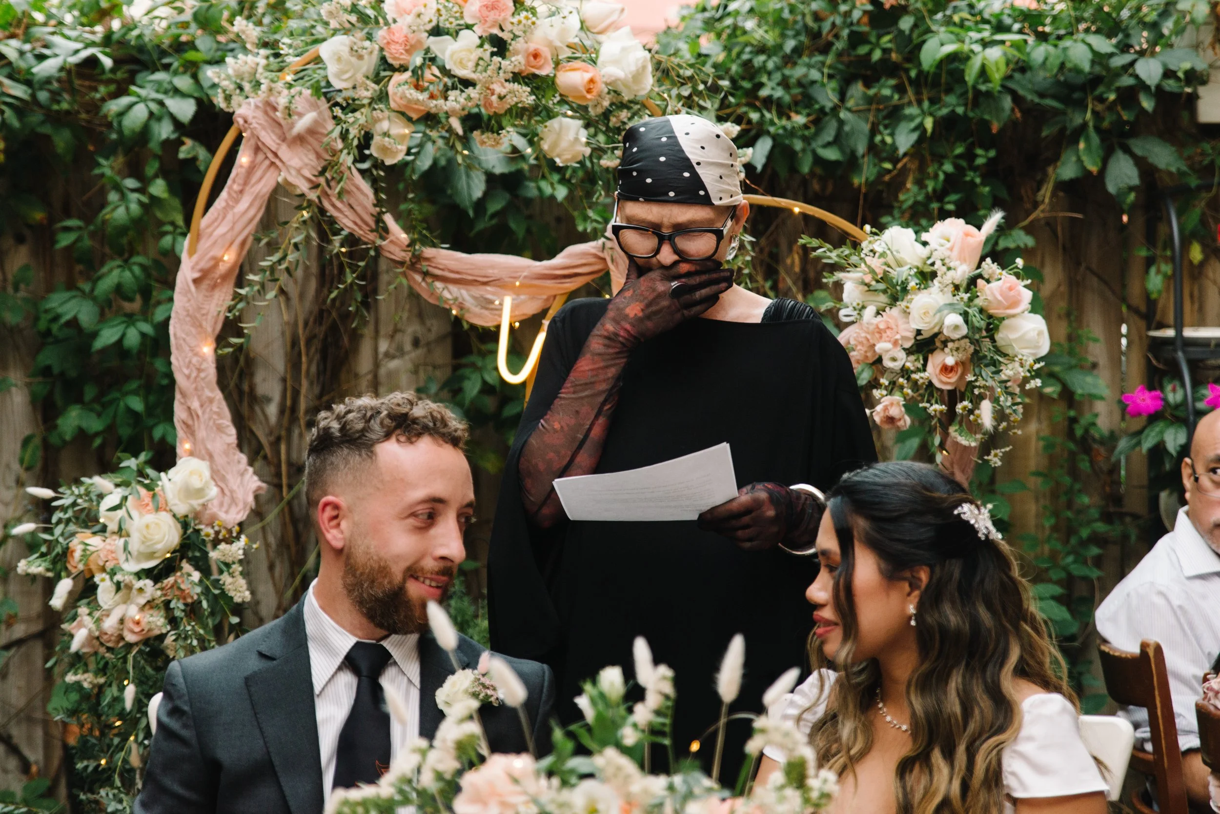 Candid photo of a mother of the groom getting emotional while making a speech at the Foxley Bistro reception in Toronto