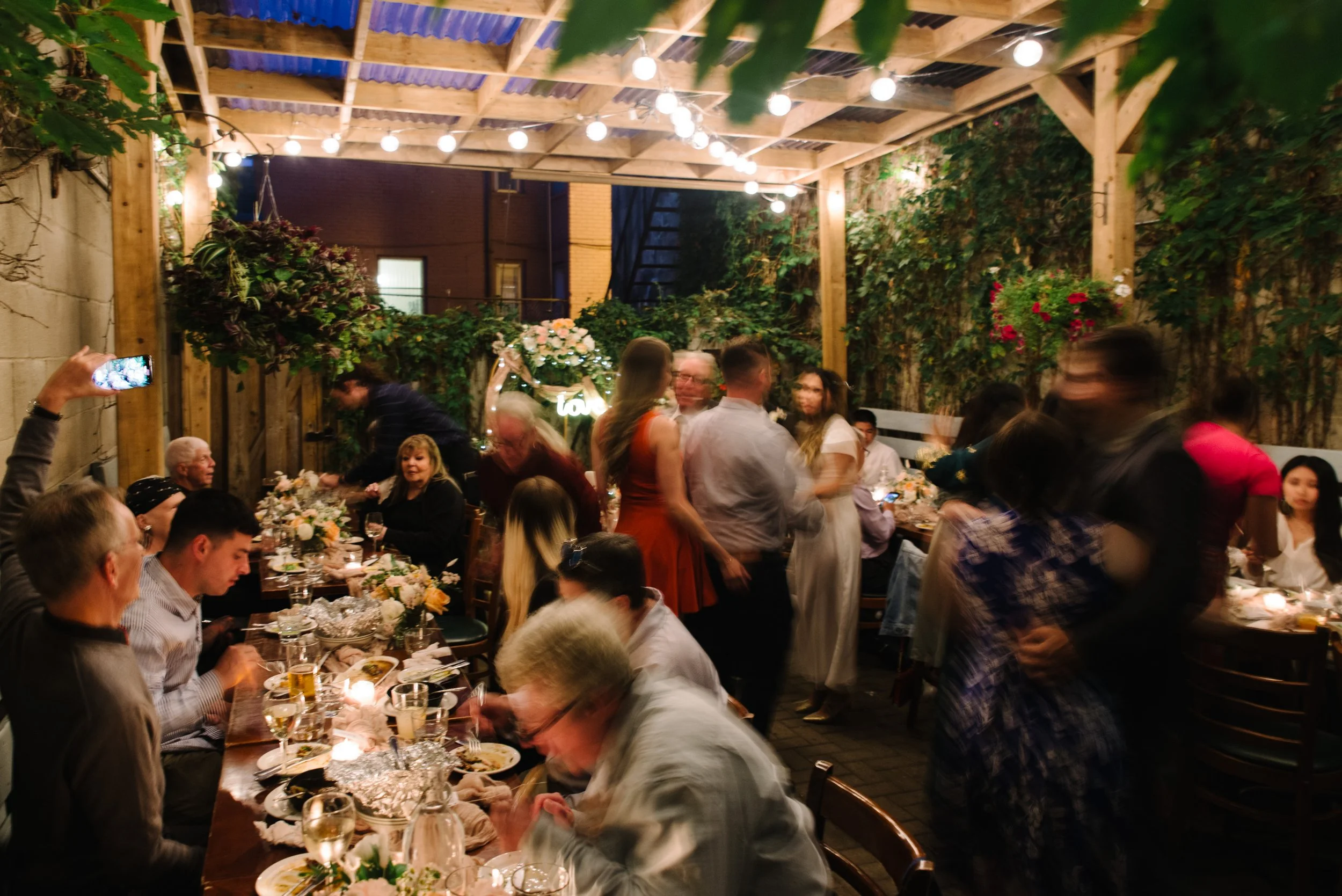Film inspired photo with motion blur of the reception space at Foxley Bistro during an intimate elopement celebration in Toronto