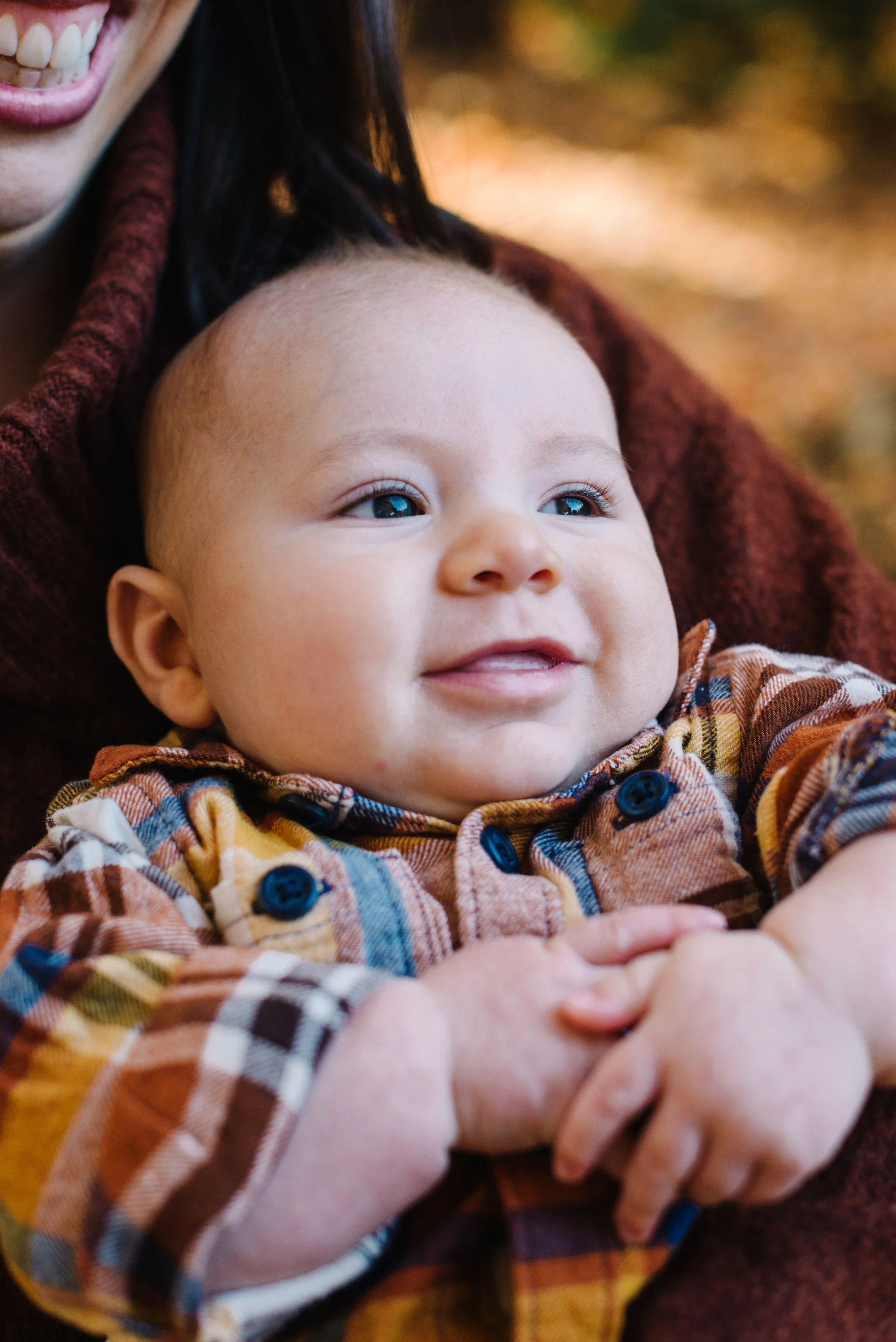 Baby boy photographed during a documentary family session by Toronto family photographer Rosewood Studios
