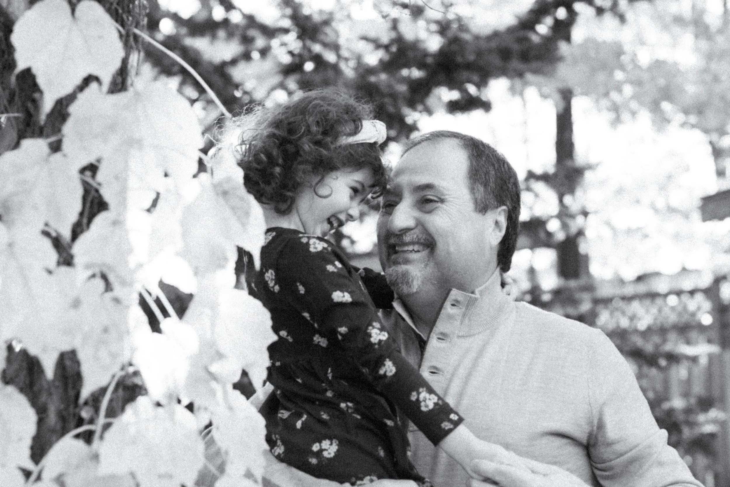 Black and white portrait of a grandfather and granddaughter during an extended family session in Mississauga