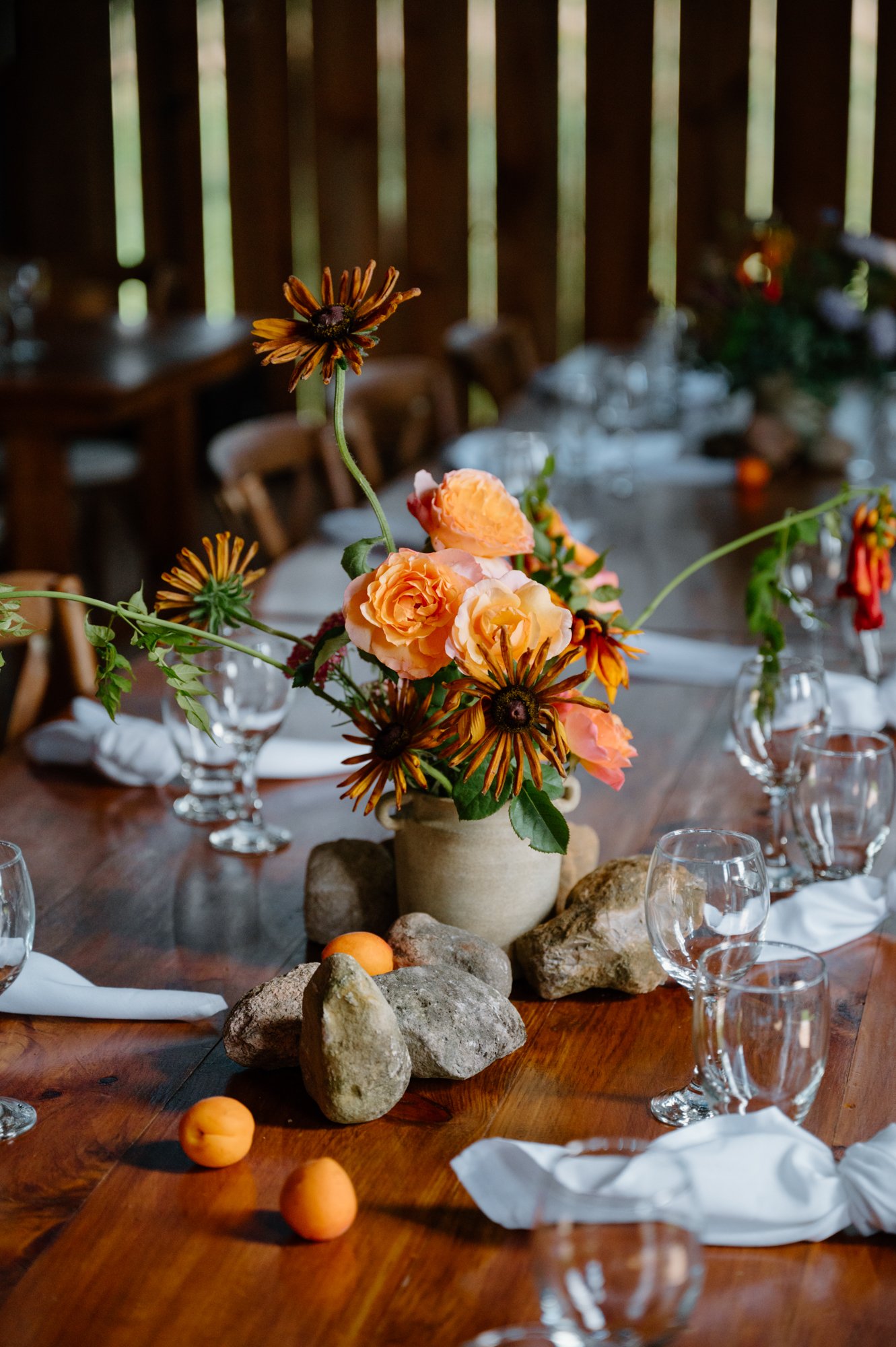 Decor for rustic wedding at Bela Farm for LGBTQ couple