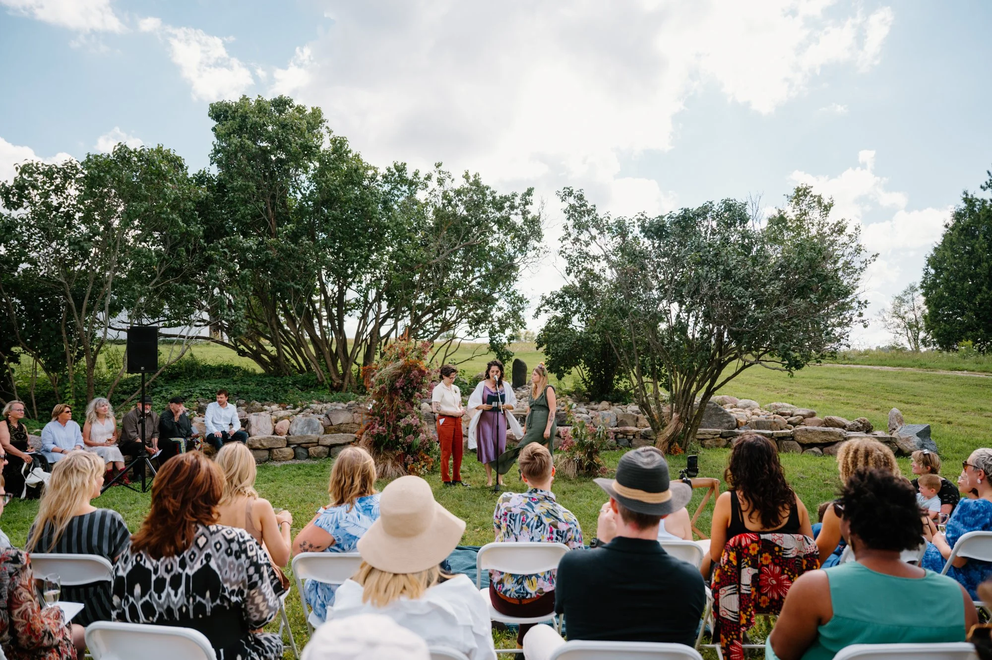 Documentary style photo of a wedding ceremony at a rustic farm near Orangeville, Ontario