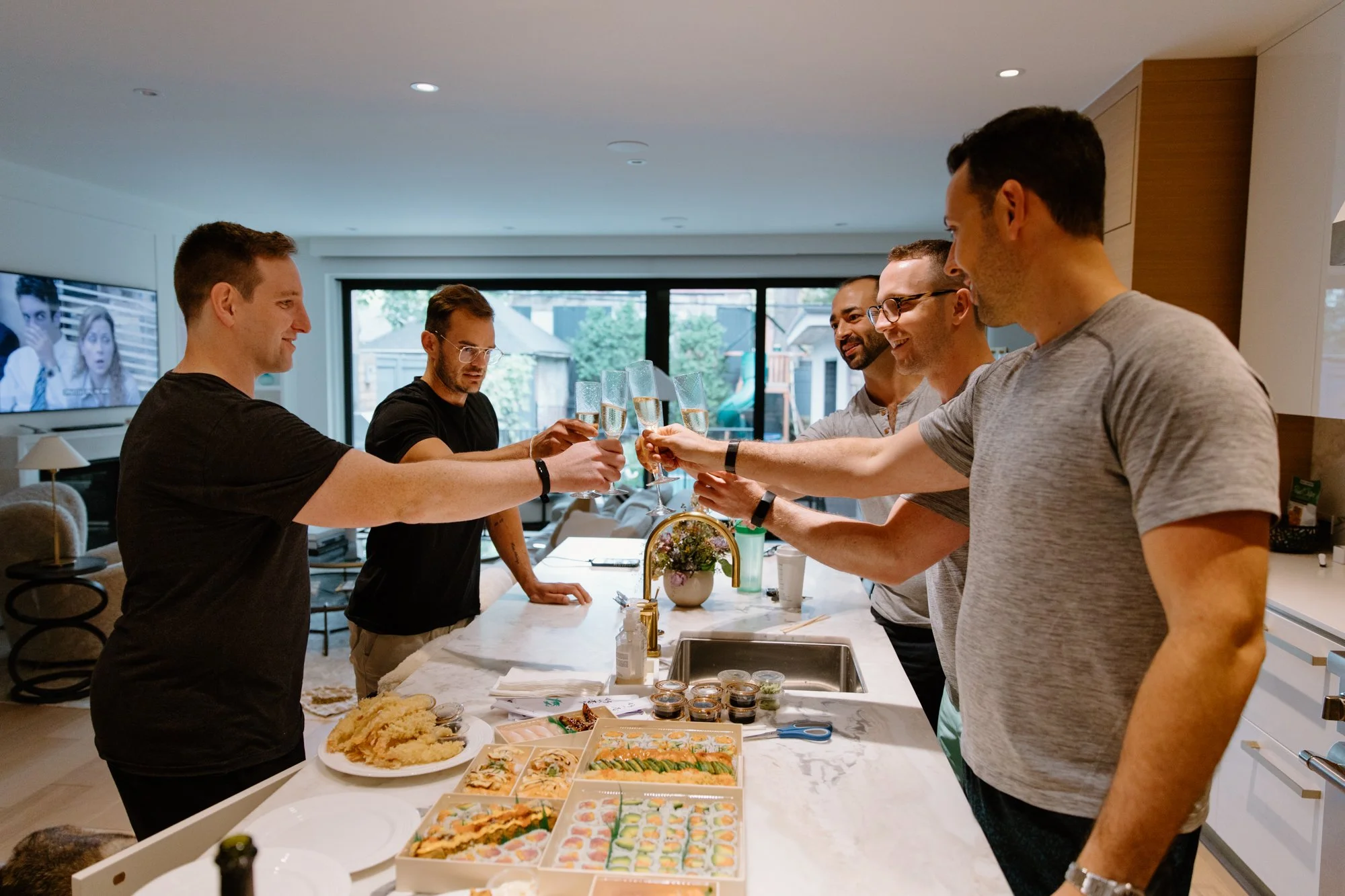 Candid groom getting ready moments before a Toronto AGO wedding