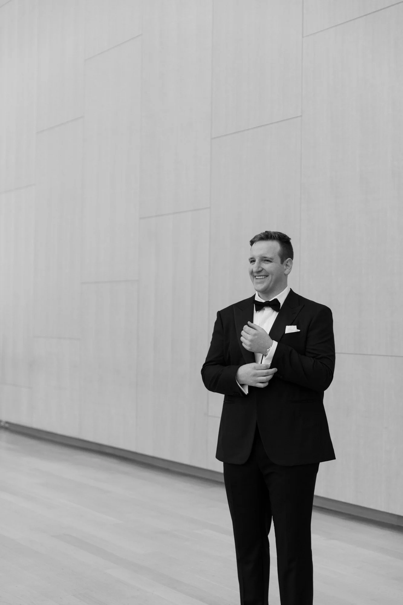 Groom portrait photographed at the Art Gallery of Ontario wedding