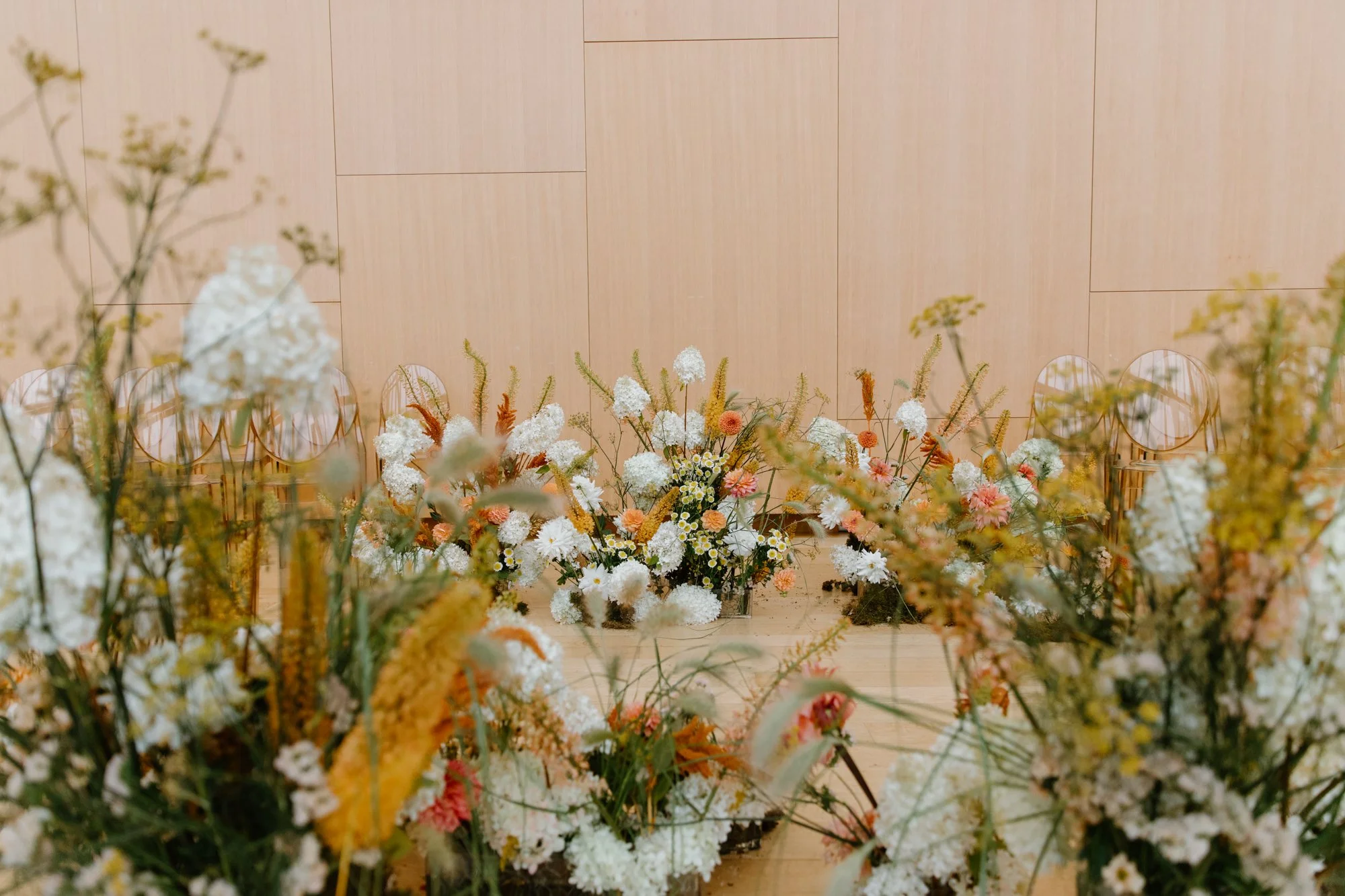 Wedding ceremony floral arrangement designed by Joey Butta White Oak Floral Co. at the Art Gallery of Ontario
