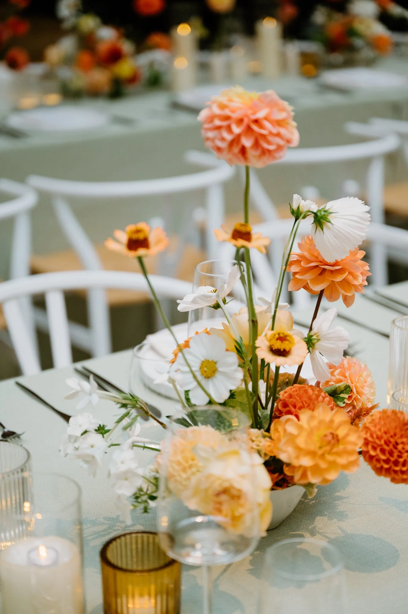 Modern wedding reception design inside the AGO in Toronto with wedding flowers by Joey Butta