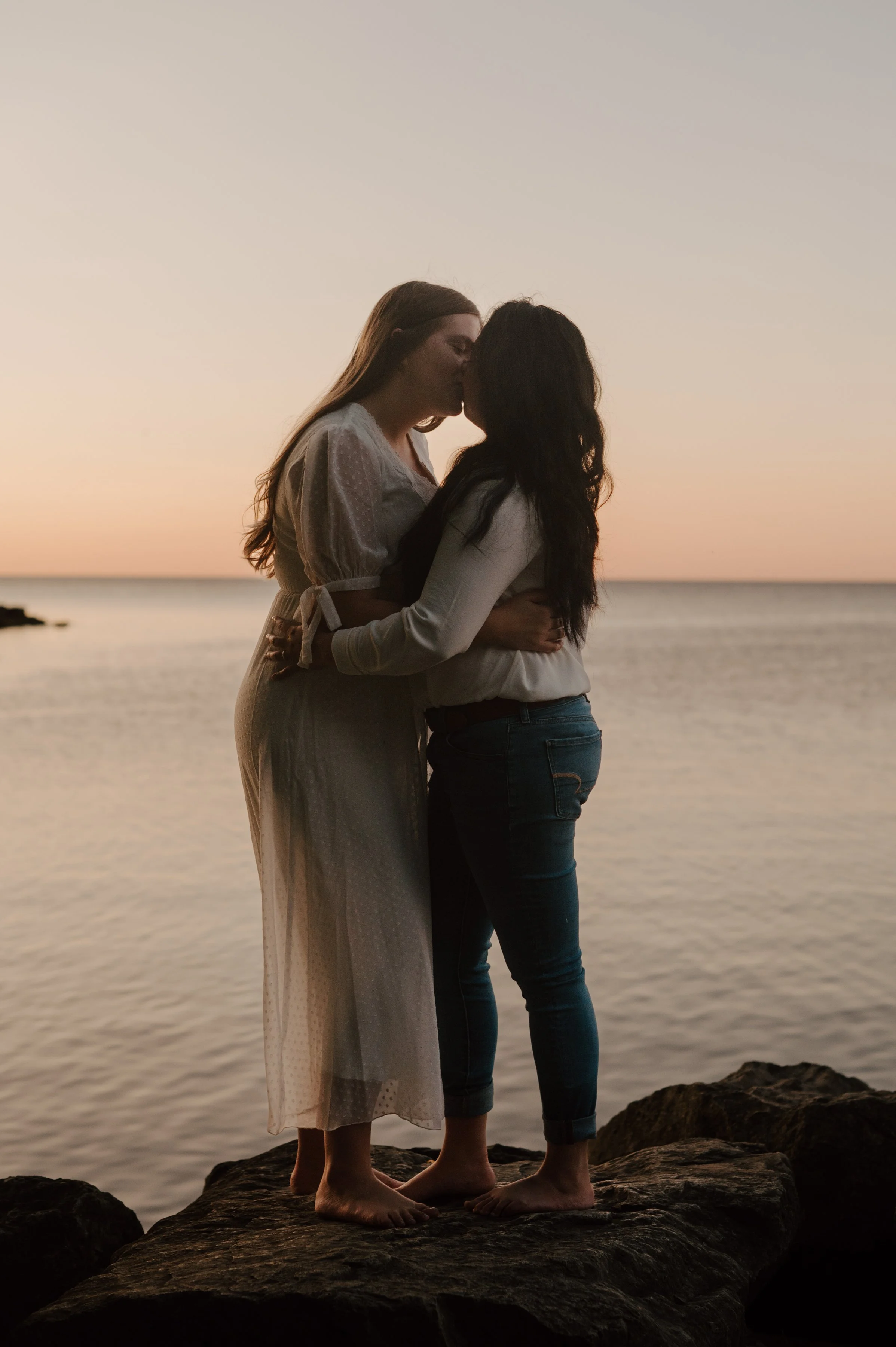 Romantic sunrise engagement session with a couple at The Bluffs in Toronto