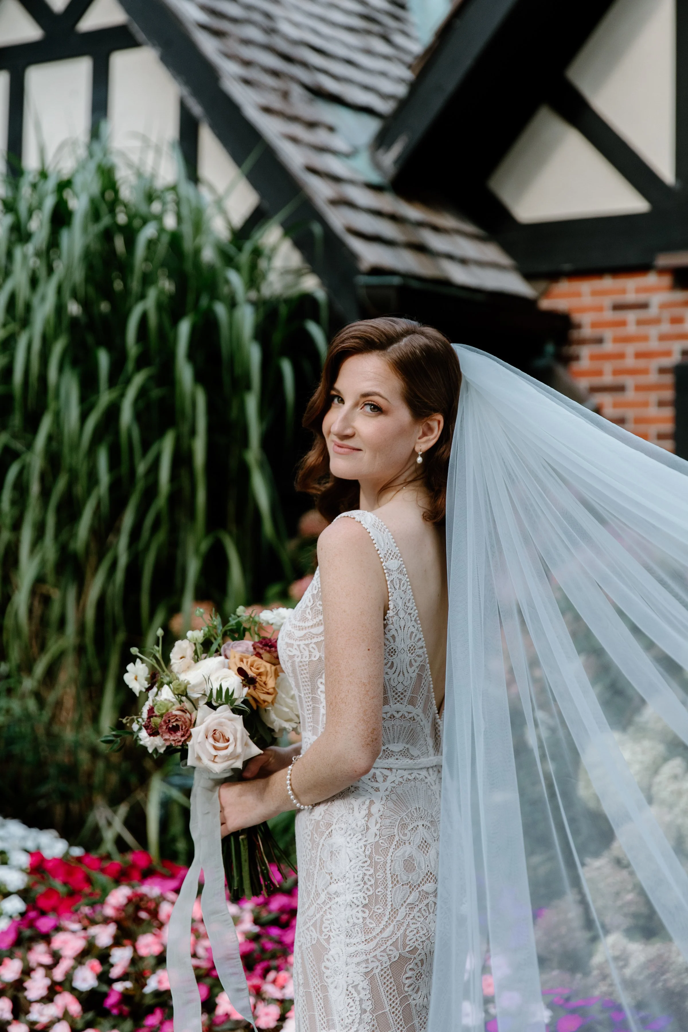 Timeless editorial portrait of a bride in a garden on her Toronto wedding day