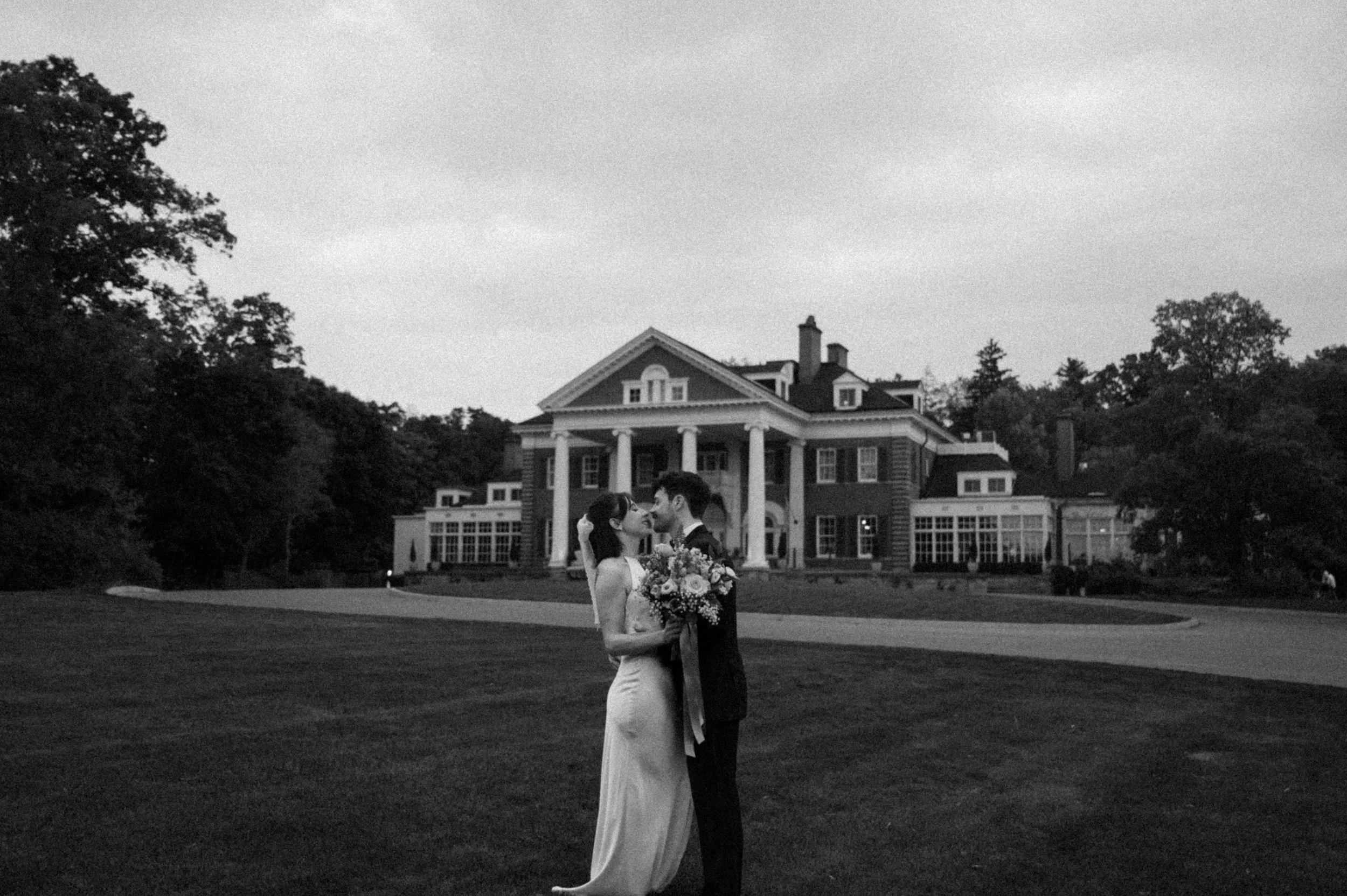 Romantic black and white photo of a couple at Langdon Hall on their wedding day