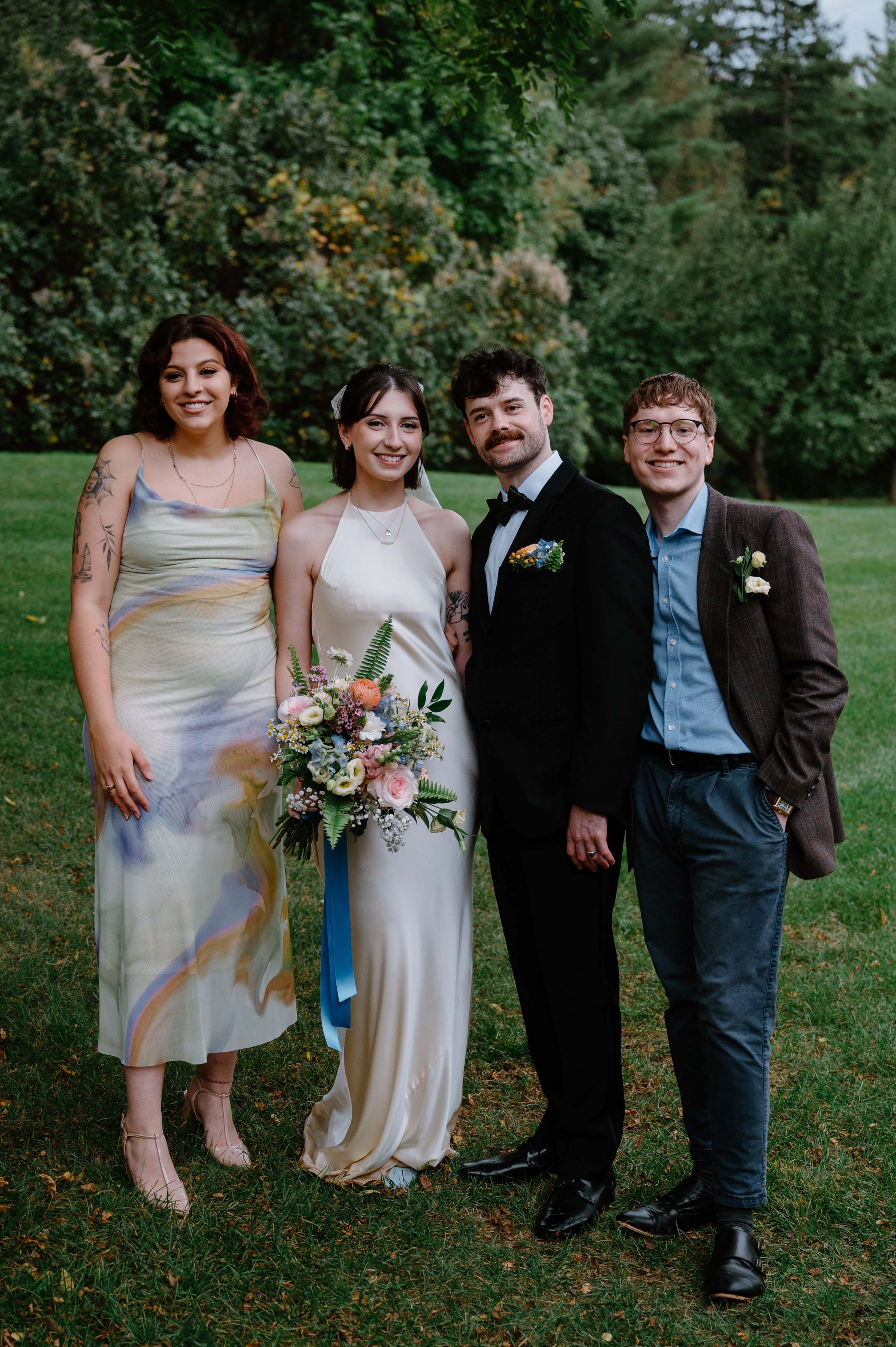 Family group portrait taken at a Langdon Hall wedding reception in Cambridge, Ontario