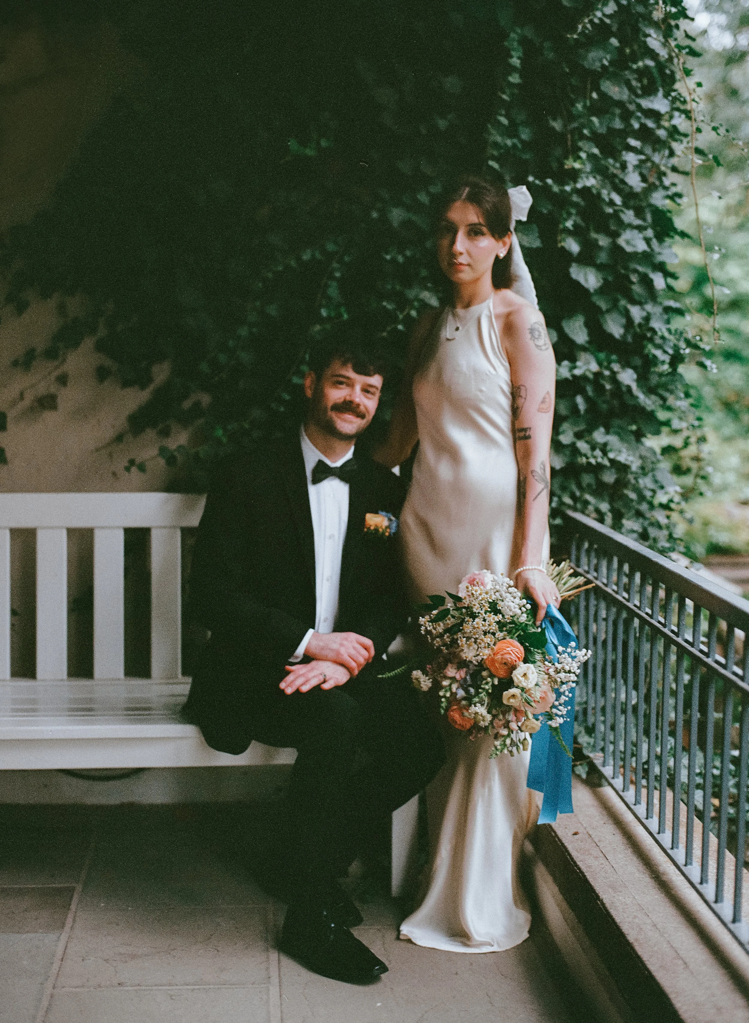 Warm-toned film photograph of newlyweds at Langdon Hall taken on medium format film