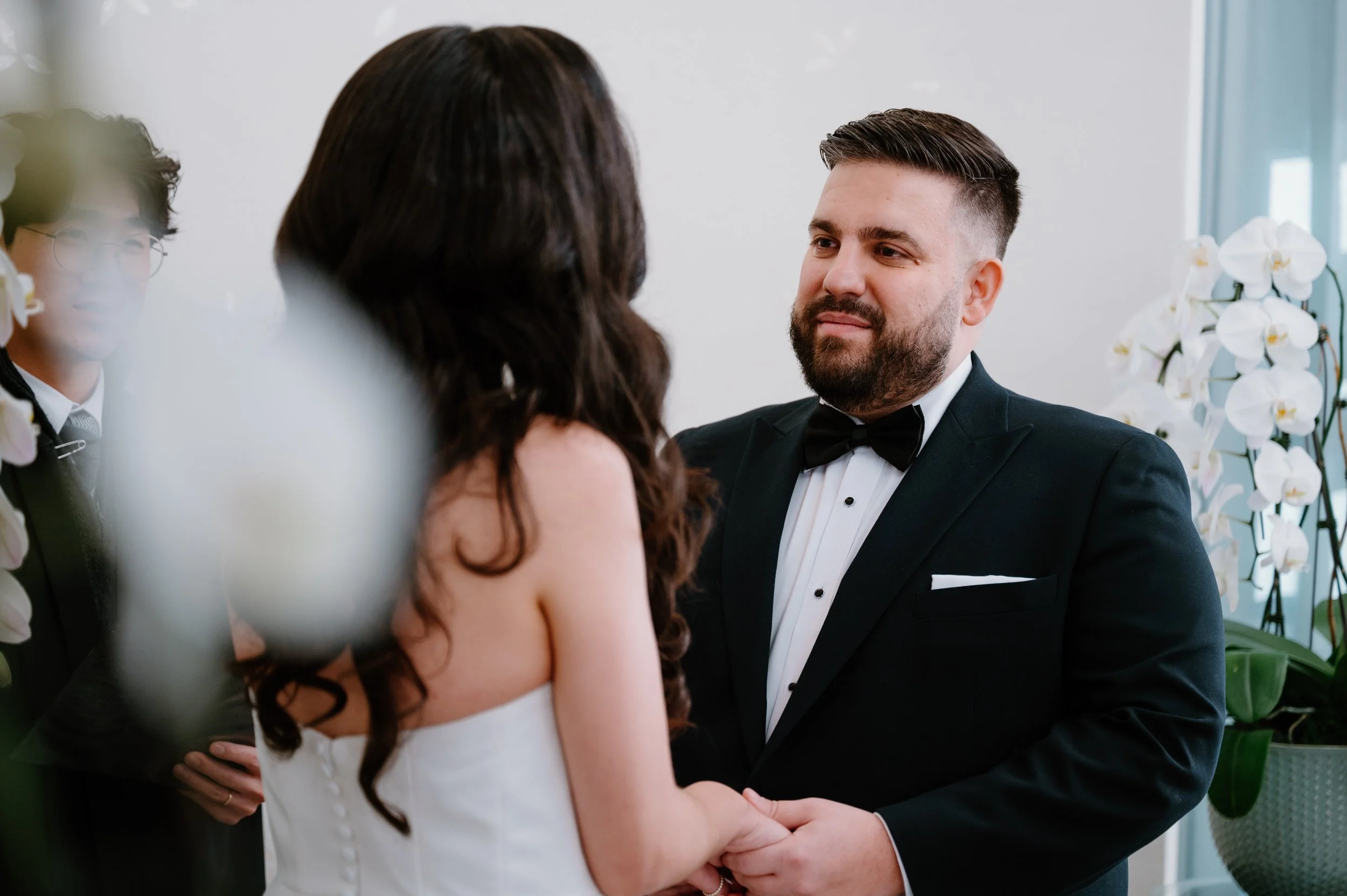 Emotional exchange during a Toronto City Hall wedding ceremony