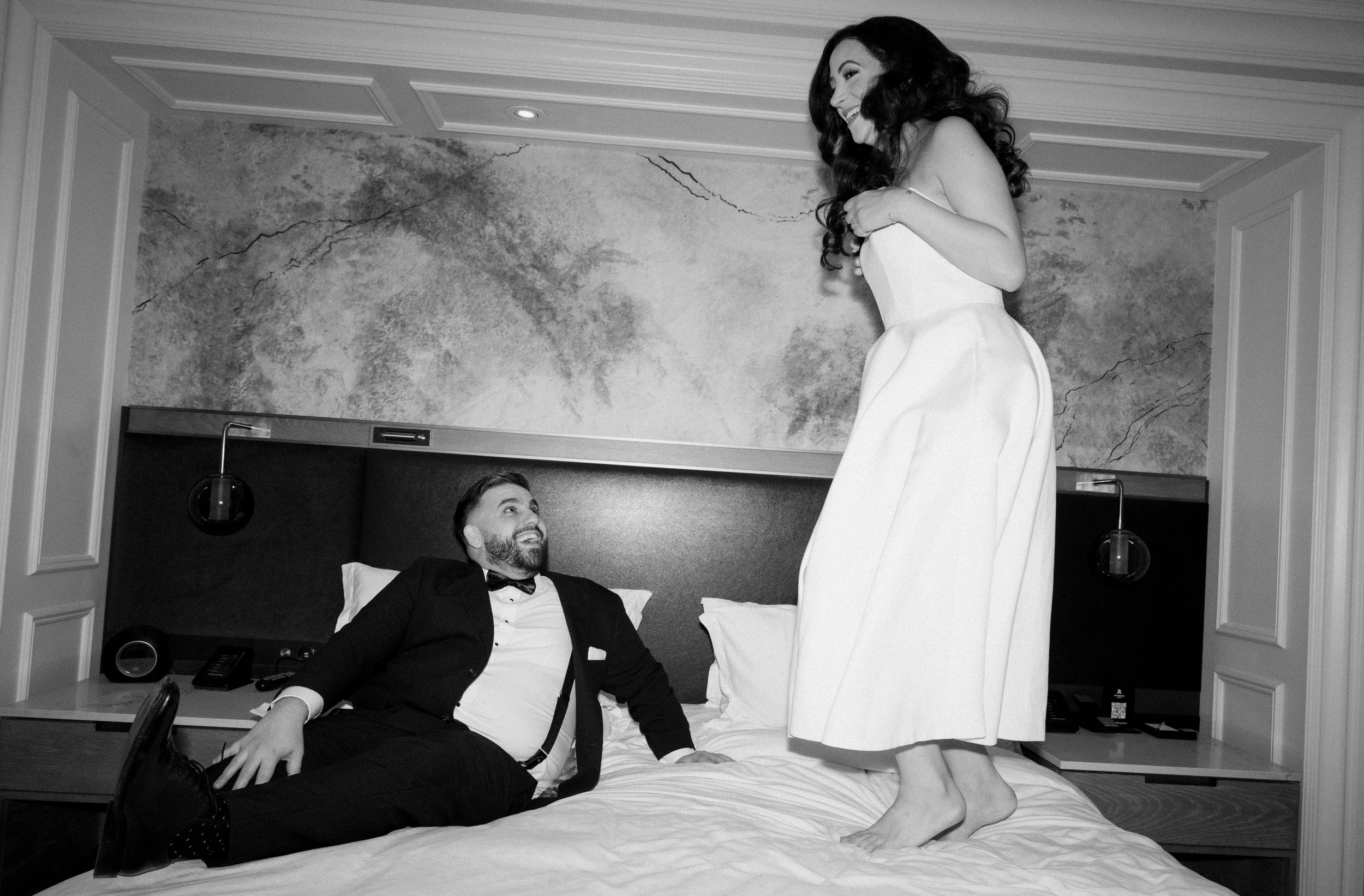 Black and white flash photography portrait of bride and groom at the St. Regis Hotel in Toronto
