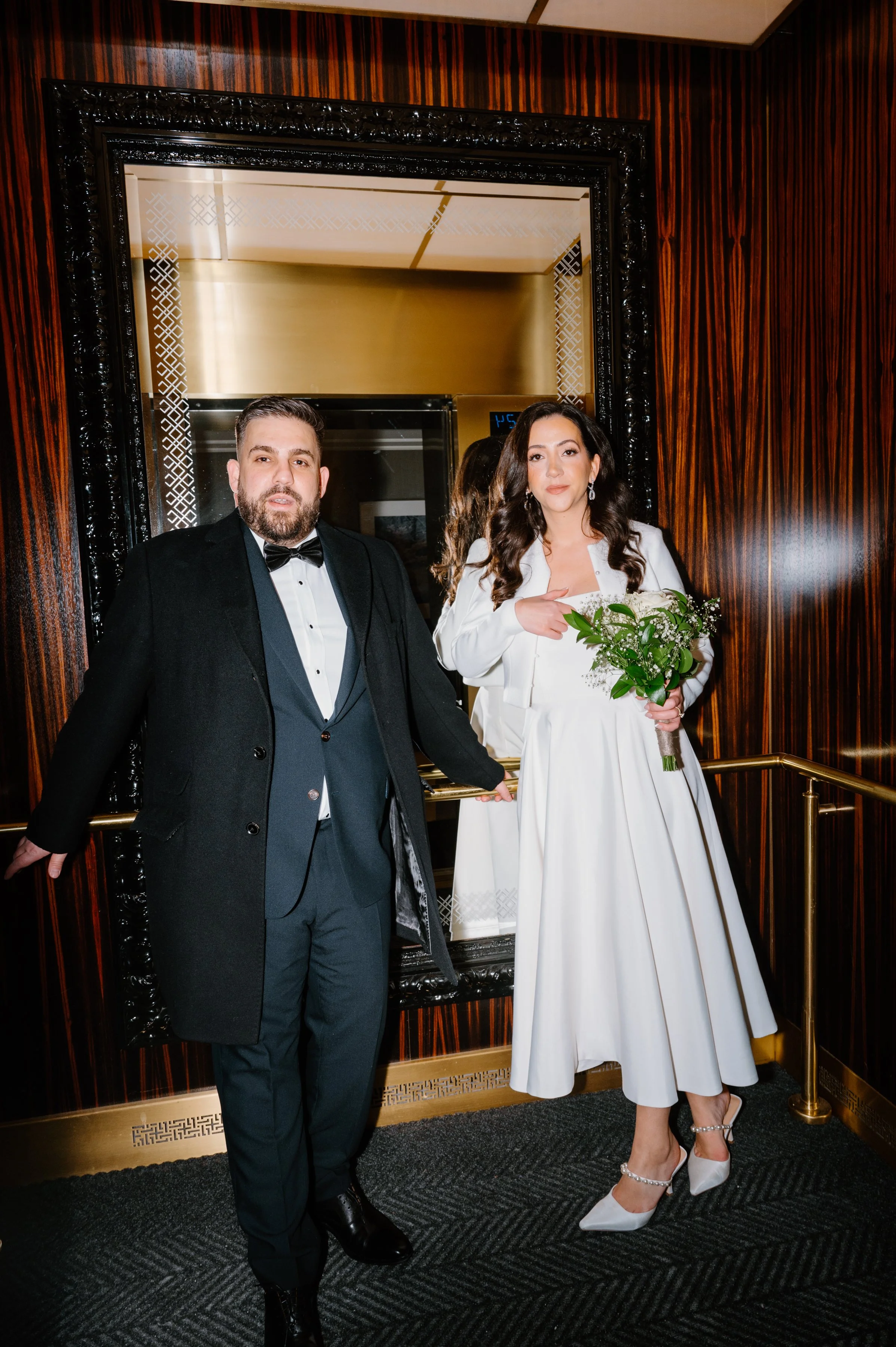 Modern elevator portrait of a couple during a St. Regis Toronto elopement