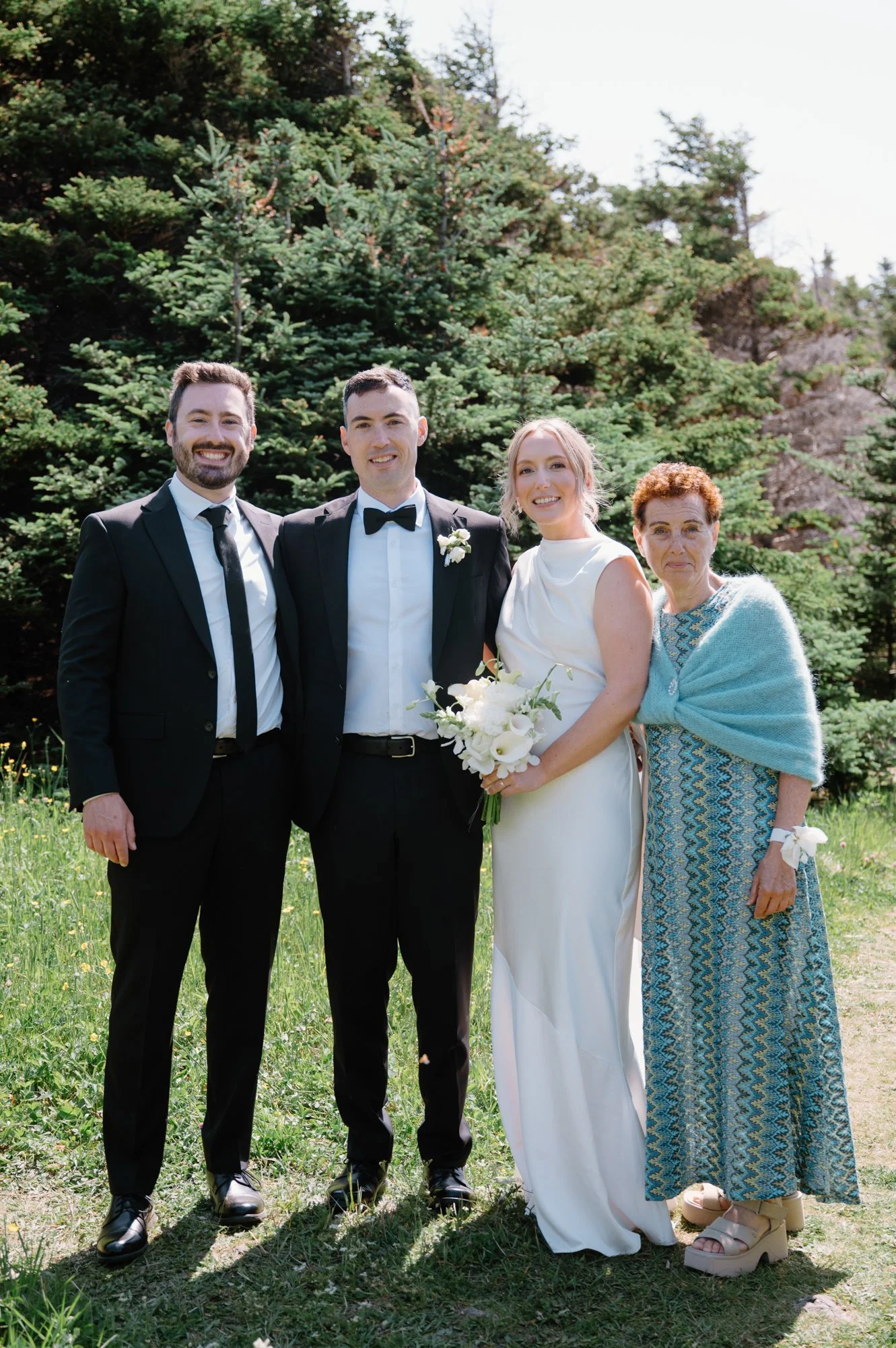 Family formal portrait at a destination wedding in Newfoundland