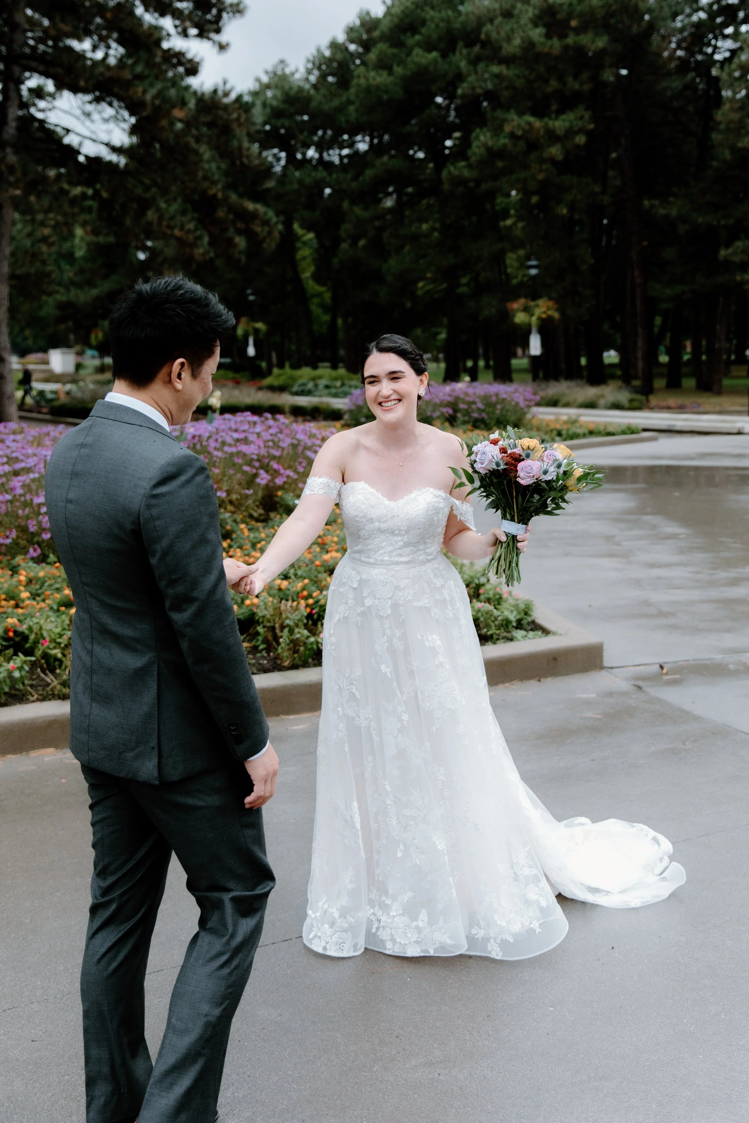 A bride and groom share their wedding day first look together