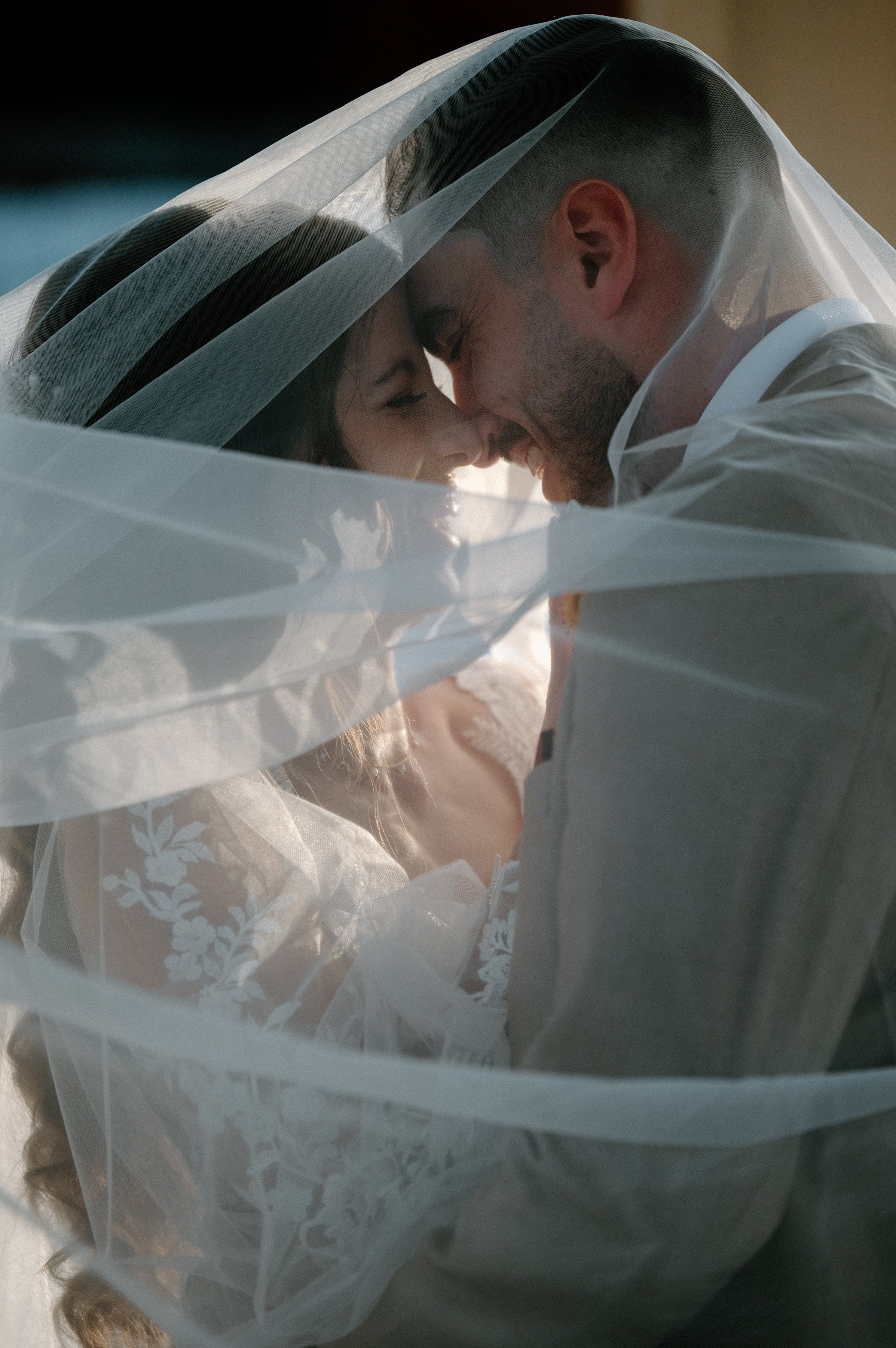bride and groom under veil editorial wedding toronto