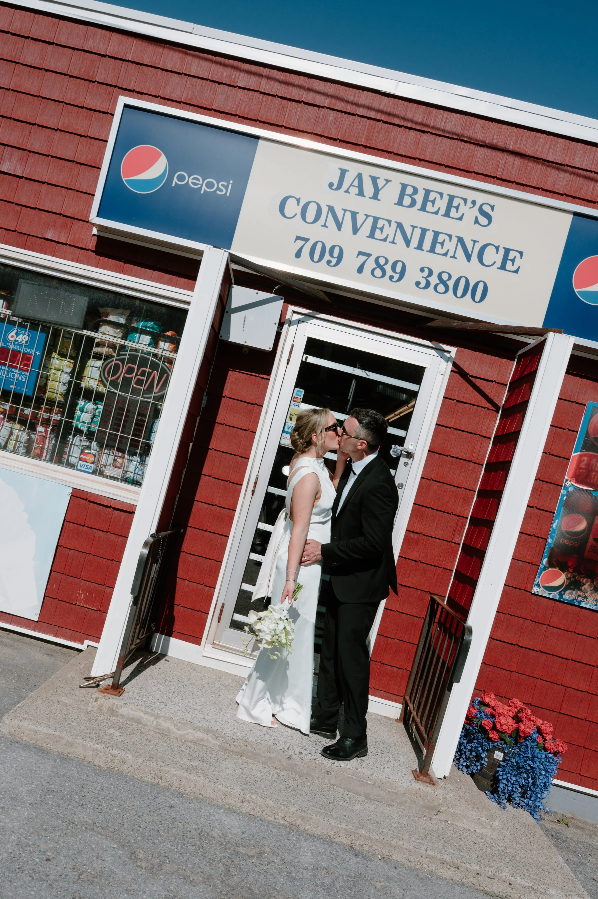 Chic editorial portrait of bride and groom at destination wedding in Newfoundland
