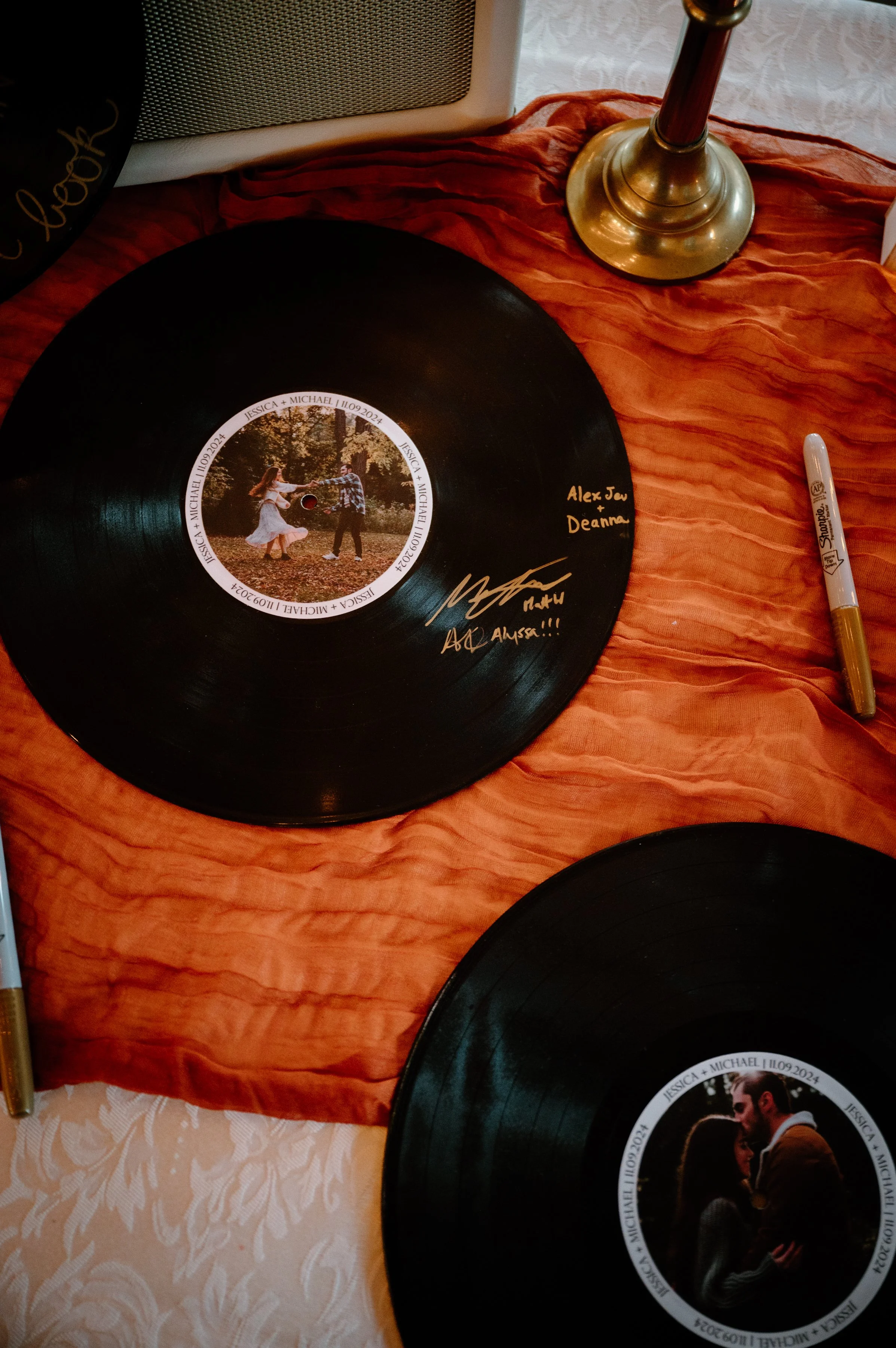 Detail photo of custom records used in lieu of a formal guest book at a Caledon wedding reception