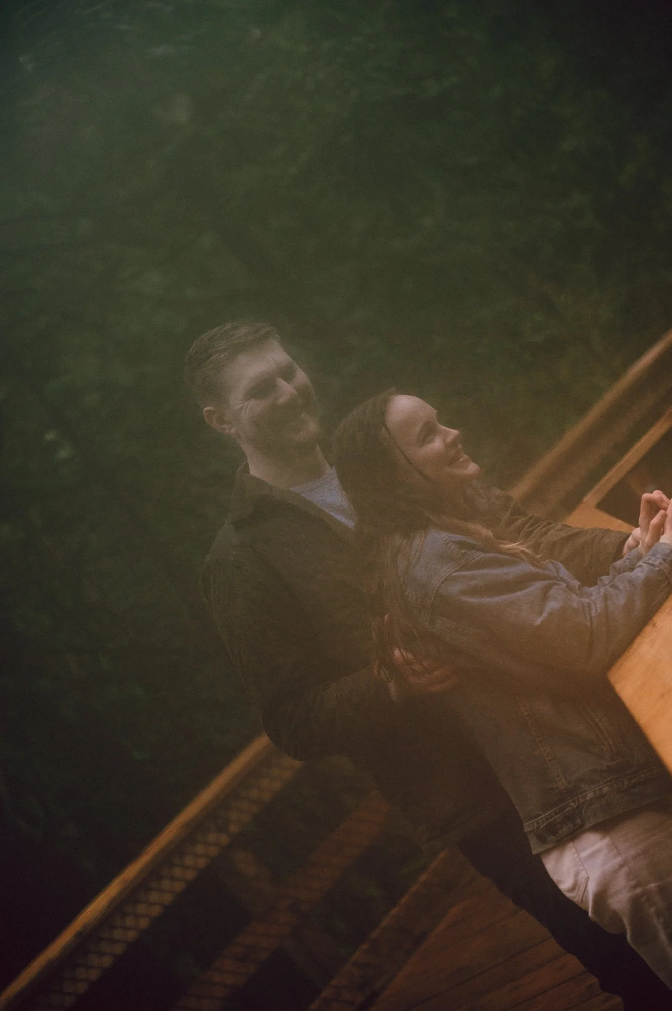 Hazy editorial inspired portrait of a couple in Lynn Valley, North Vancouver with a warm film-like quality