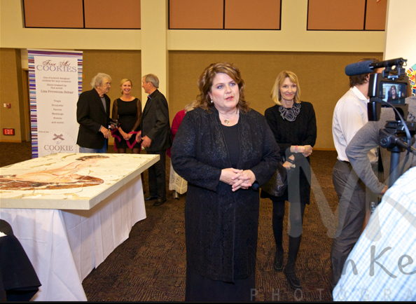 Media interview at the 2013 Palm Springs Fine Art Fair. A 4'x6' cookie "Shattered Love" was served to the guests.