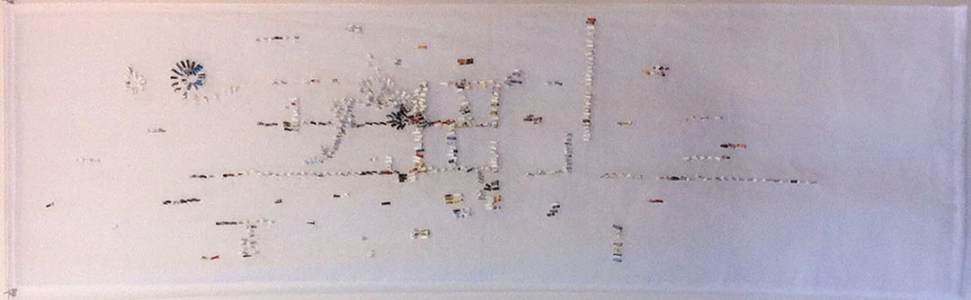 Shredded: Off the Grid, panel 2, 2012. H74" x W22". Paper stitched on Organdi fabric.