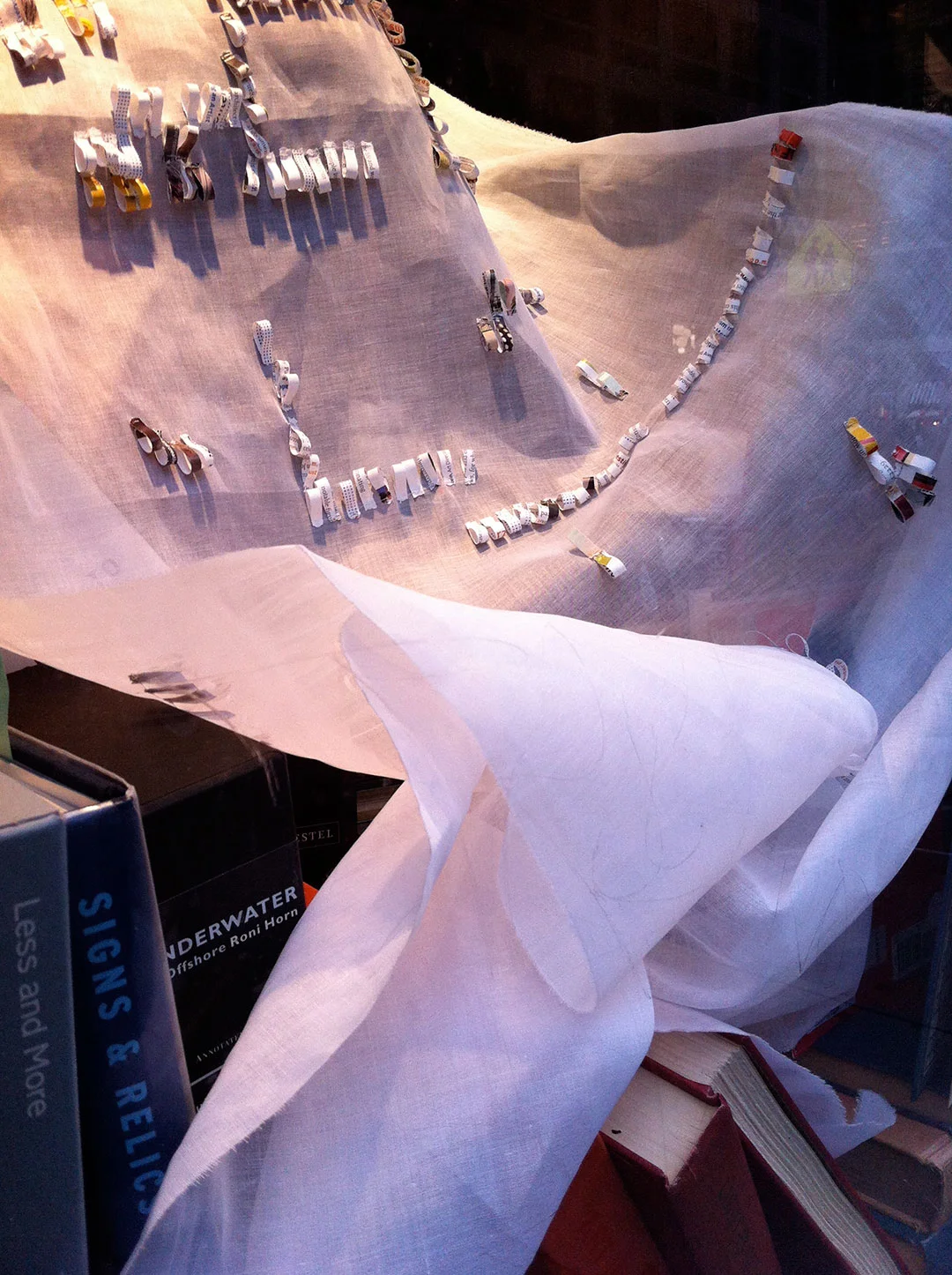 Shredded: Off the Grid, panel 2, installation view at the Manhattan Midown Public Library windows..