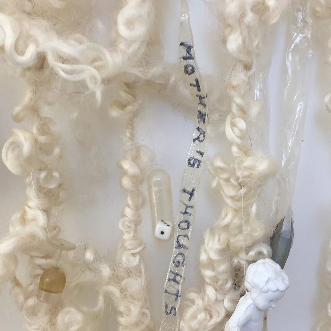 Me as a Goddess, 1, 2008. Detail. Aproximatively 6' long. Sheep wool, plastic, oil paint, ribbon, chalcedony stone and thread.