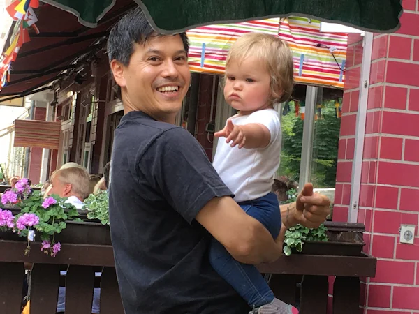 My friend Daniel—former graffiti writer and current proprietor of the awesome Reds Deli, 10 Kreuzberg Strasse—with cosmic friend Baby Alice.