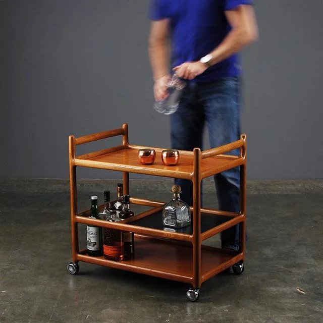 Friday afternoon--who's ready for a drink? 
This fluidly sculptural Johannes Andersen bar cart's in our Etsy shop now. $645
#johannesandersen #midcenturymodern #midcenturyfurniture #vintagefurniture #madsen_modern #barcart #barcartdecor #barcartstyle