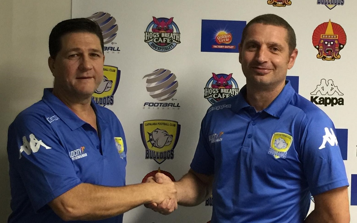 (Photo: Capalaba FC's Shaun McAney welcome Steve Duncan as JDOC)