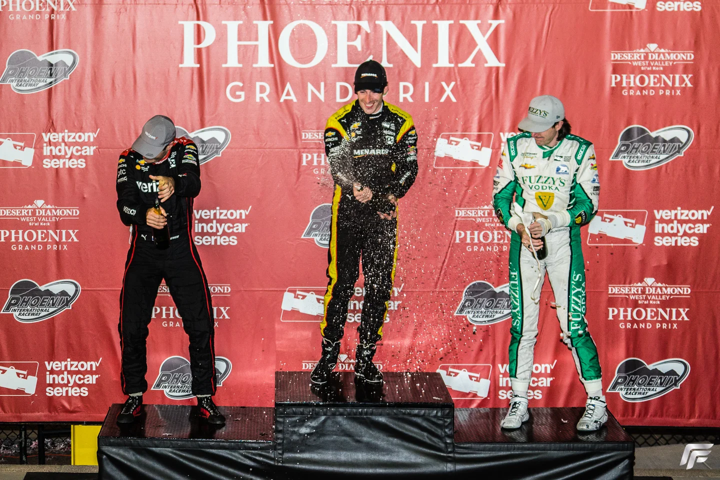 The 2017 IndyCar Grand Prix podium, 1st Simon Pagenaud (center), 2nd Will Power (left), 3rd JR Hildebrand (right)