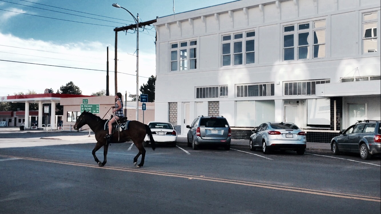 Transportation by horse in the middle of town....If this isn't quintessential Texas, I don't know what is. 