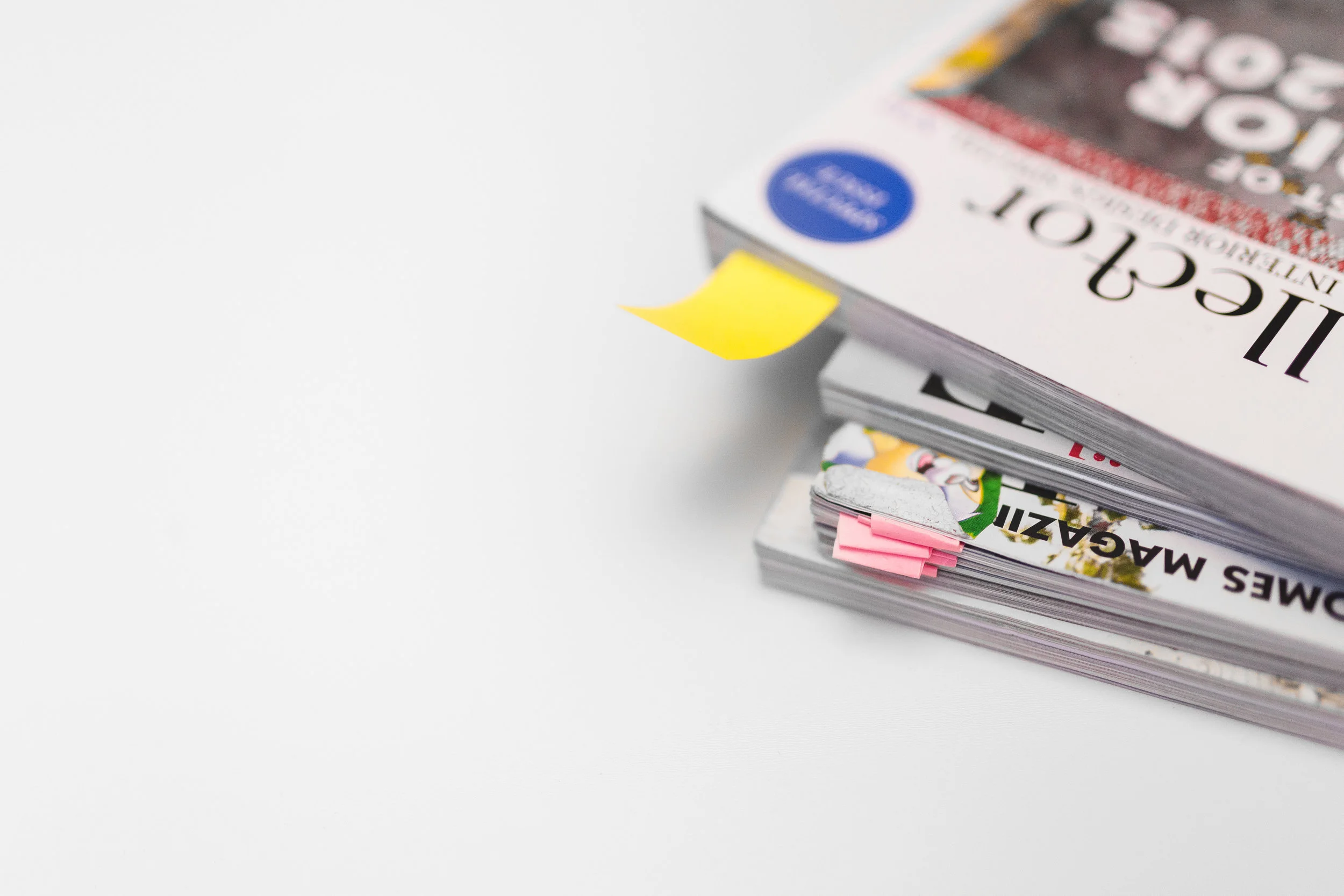 kaboompics.com_Stack of white magazines with copy space.jpg