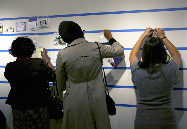 Neighborhood ephemera archive wall at the final exhibition