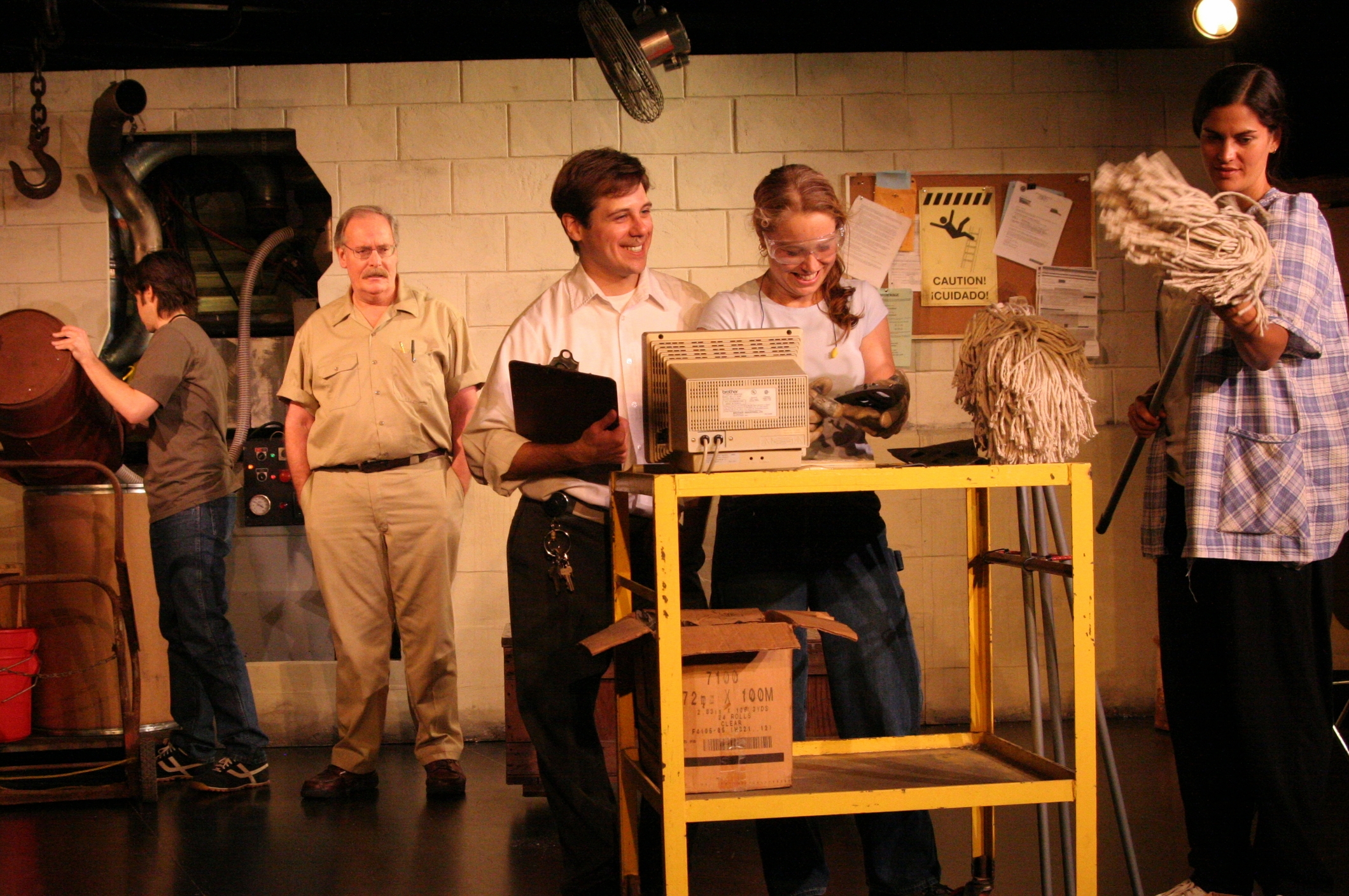 A scene from American Machine at FlynnSpace. From l. to r. Colin Cramer, Dennis McSorley, Seth Jarvis, Bridget Butler, and Teresa Lorenco. Photo Myesha Gosselin