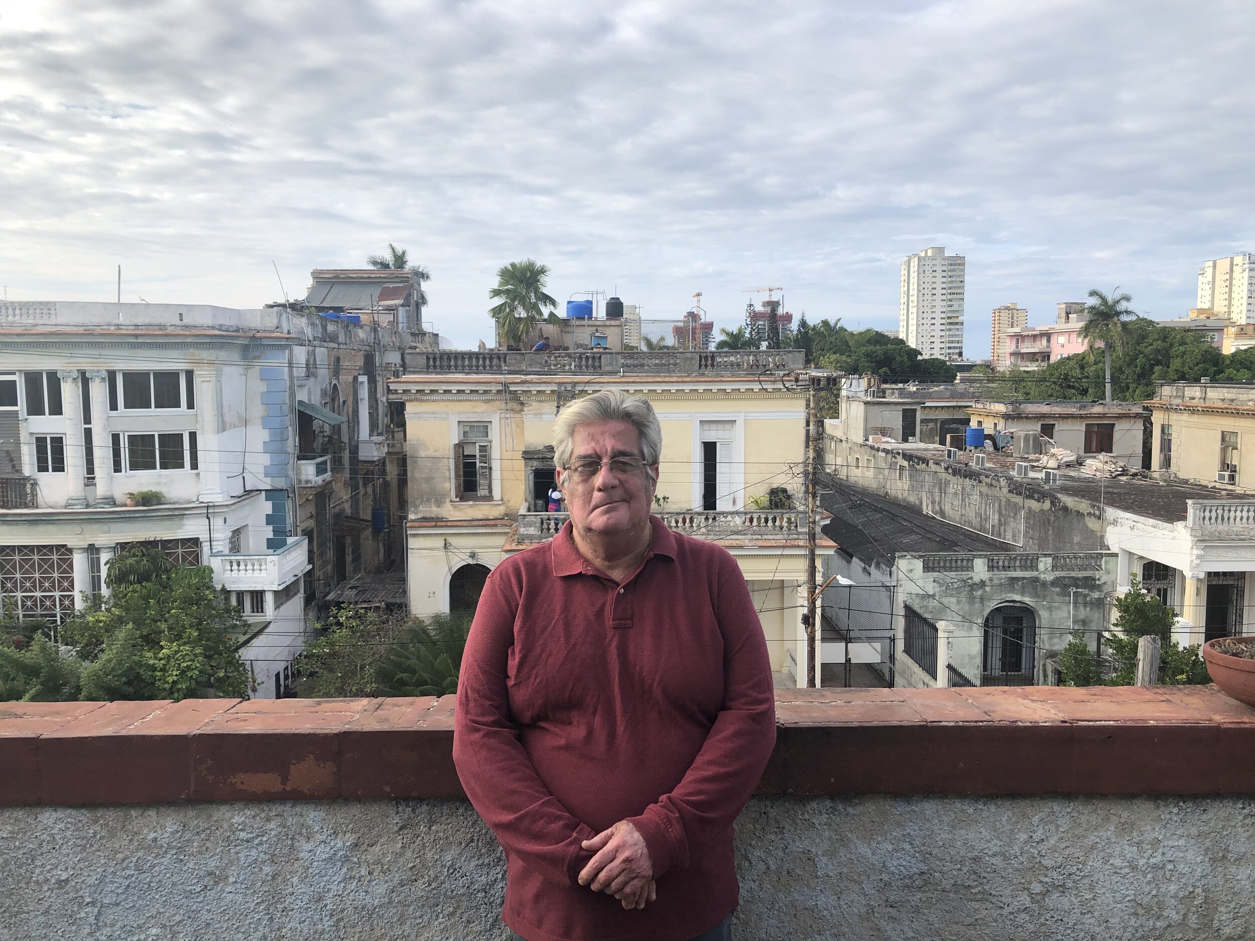 Enrique photo on balcony.JPG