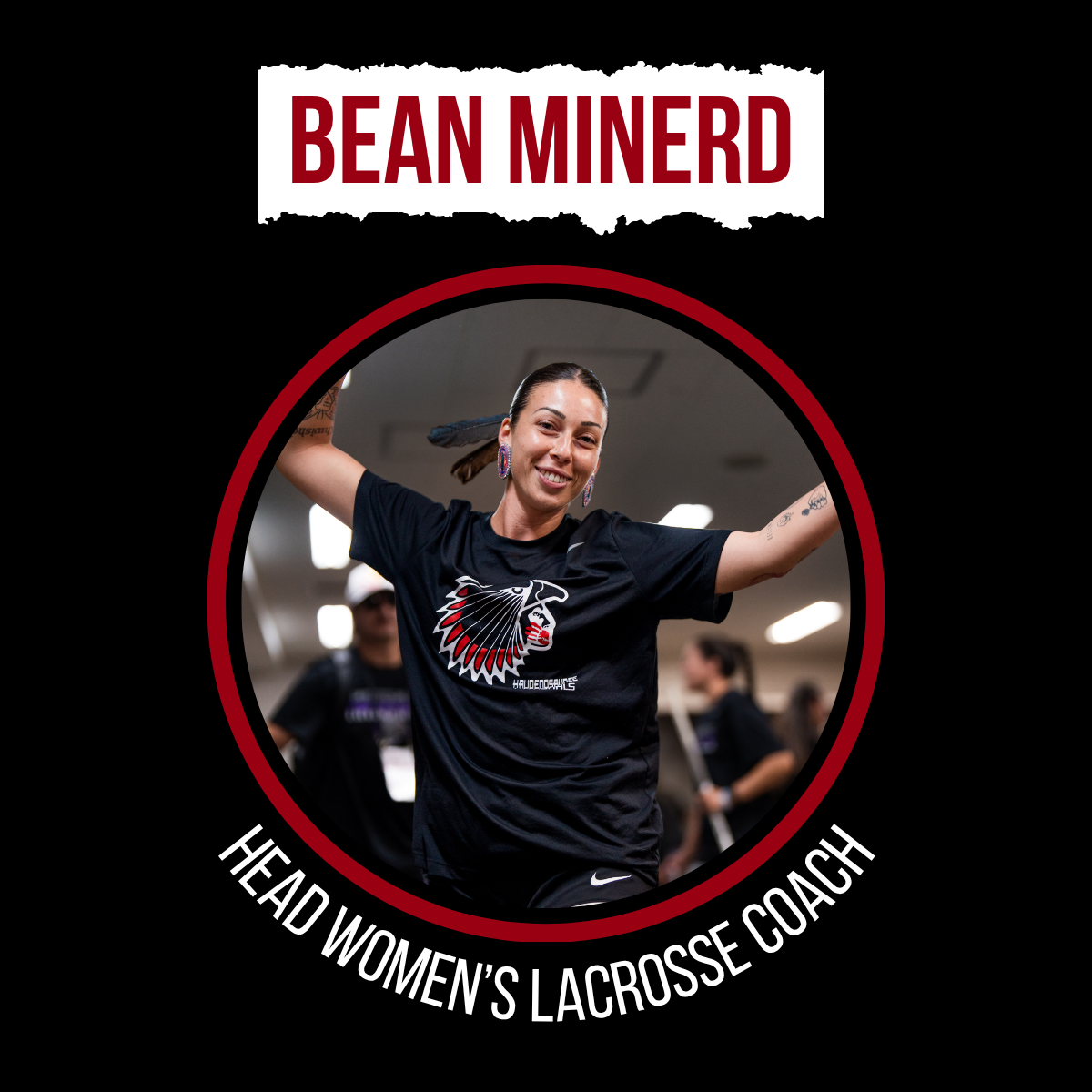 A Native American Lacrosse player looks at the camera.
