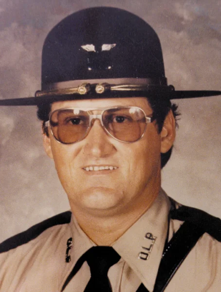 Water Enforcement Safety Officer Mark Harris September 2, 1984 Harris joined the Oklahoma Lake Patrol in 1982. Officer Harris was enroute to investigate a reported drowning at Lake Thunderbird when he stopped a vehicle on I35 near Indian Hills Road in Cleveland County for speeding. As he wrote the citation, a car traveling on the Interstate ran off the road, struck Officer Harris, then smashed into the second car. Officer Harris was thrown into the roadway and struck by a third vehicle. The driver of the vehicle that ran off the road was later charged with manslaughter. The driver of the third vehicle that struck Officer Harris left the scene, and was never found. 